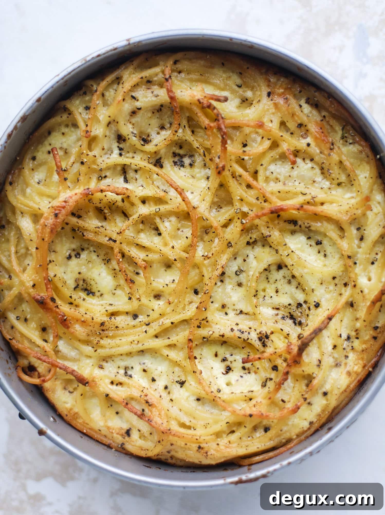 Cacio e Pepe Savory Pie Recipe: Creamy Italian Peppery Tart 5 Hello lover! Cacio e pepe pie is made with parmigiano-reggiano cheese, black pepper and bucatini pasta. Baked until cheese and bubbly, it's to die for.