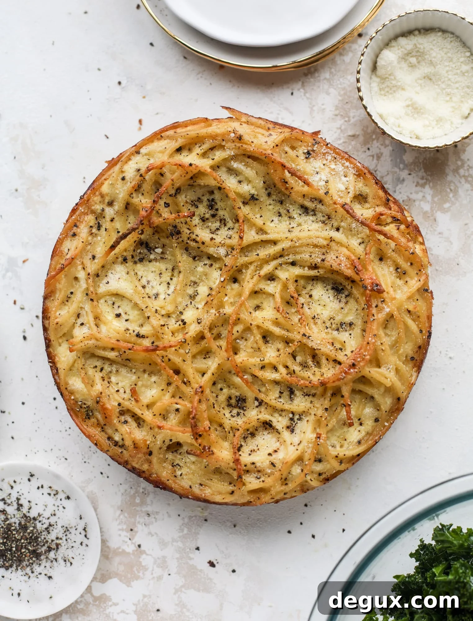 Cacio e Pepe Savory Pie Recipe: Creamy Italian Peppery Tart 8 Hello lover! Cacio e pepe pie is made with parmigiano-reggiano cheese, black pepper and bucatini pasta. Baked until cheese and bubbly, it's to die for.