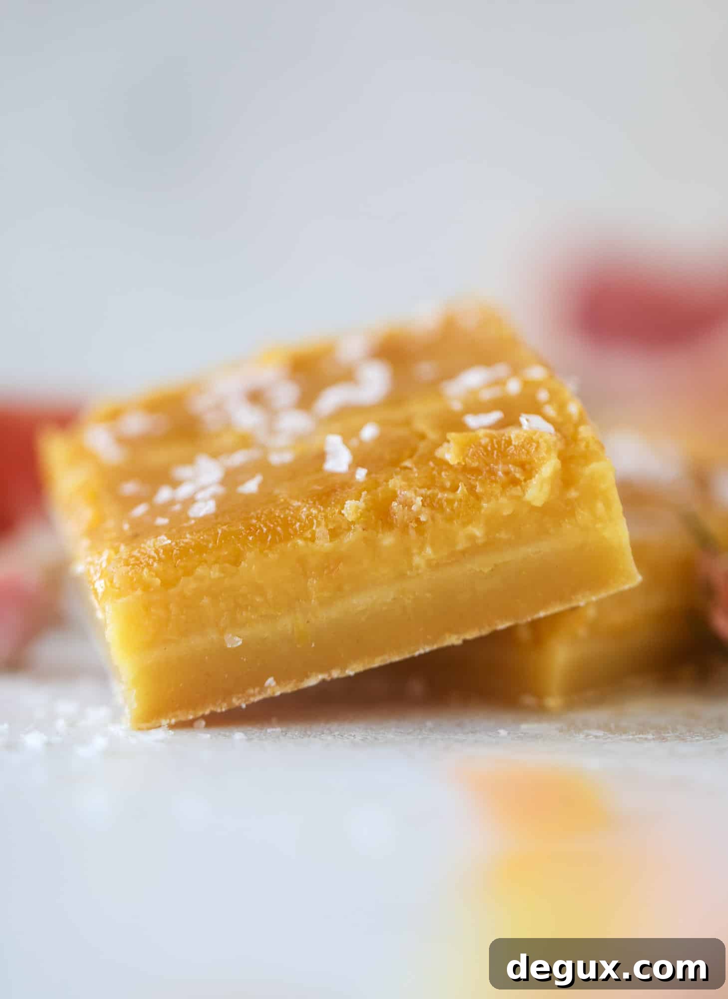 Salted Citrus Dessert Bars with Sea Salt Glaze 5 These salted citrus bars are made of both grapefruit and lemon curd on a buttery shortbread crust. Top with flaked sea salt for the perfect bite!