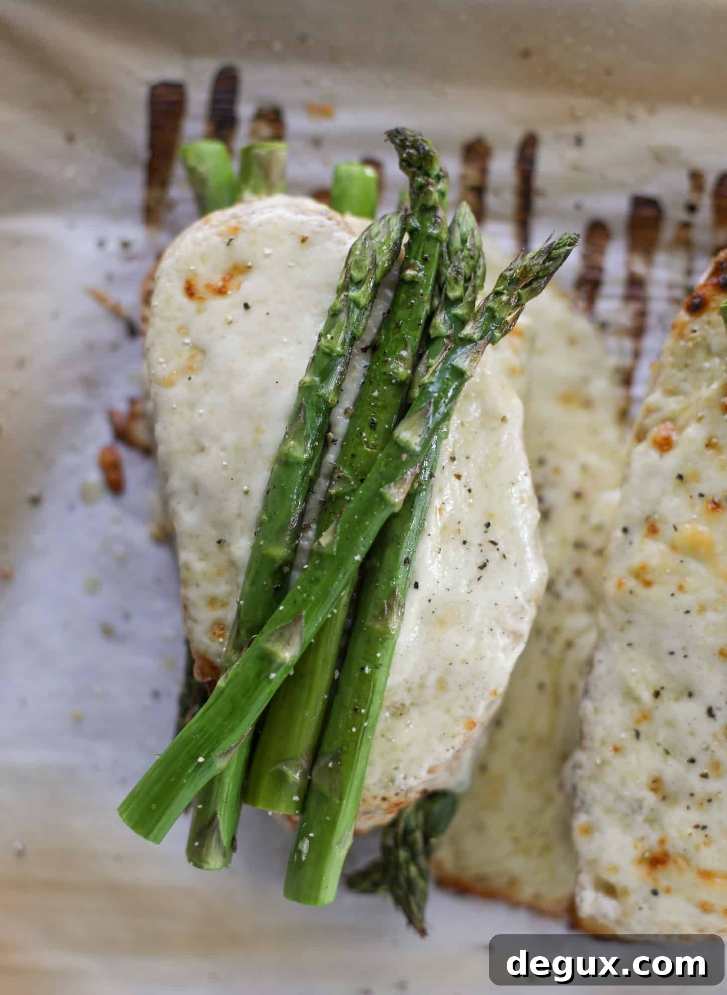 Roasted Asparagus and Prosciutto Croque-Madame Recipe 7 This roasted asparagus croque madame is made with thinly-sliced prosciutto and a fontina cheese sauce. Lots of dijon and an egg on top!
