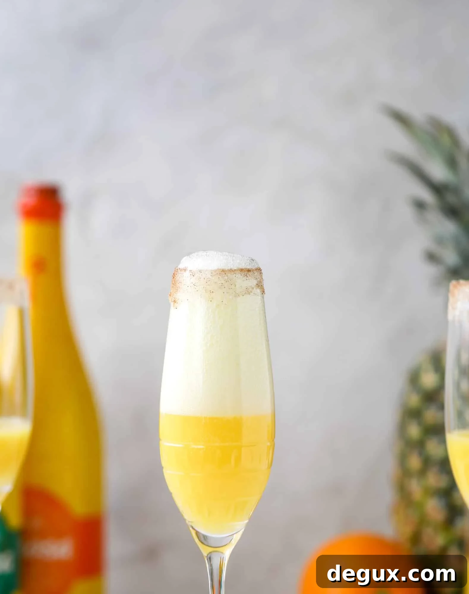 Hummingbird Mimosa Cocktail Recipe for Spring Brunch 2 The hummingbird mimosa is a spin on the classic hummingbird cake: pineapple juice, orange juice, champagne and a cinnamon sugar rim!