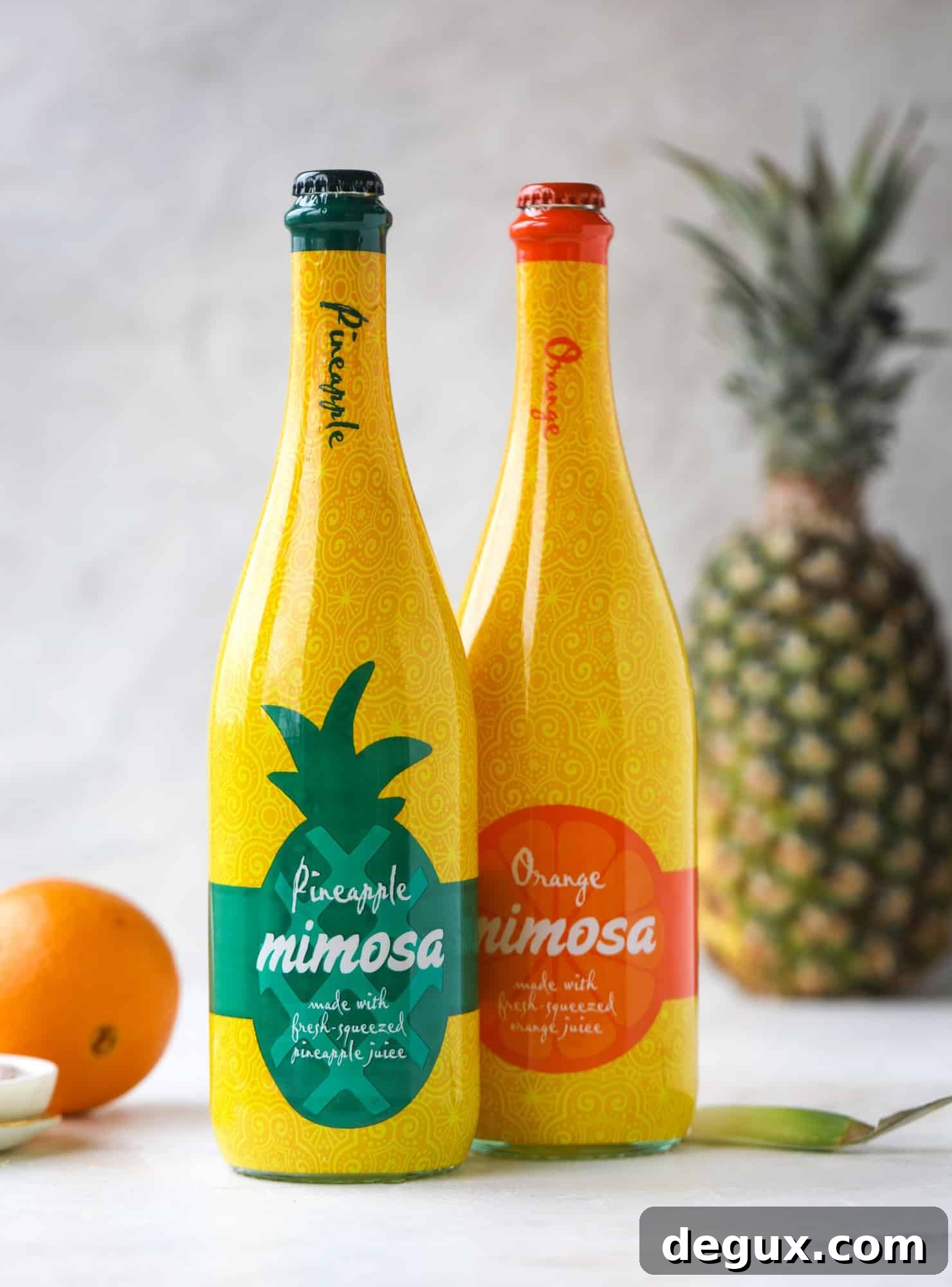 Hummingbird Mimosa Cocktail Recipe for Spring Brunch 3 pineapple and orange mimosas from ALDI