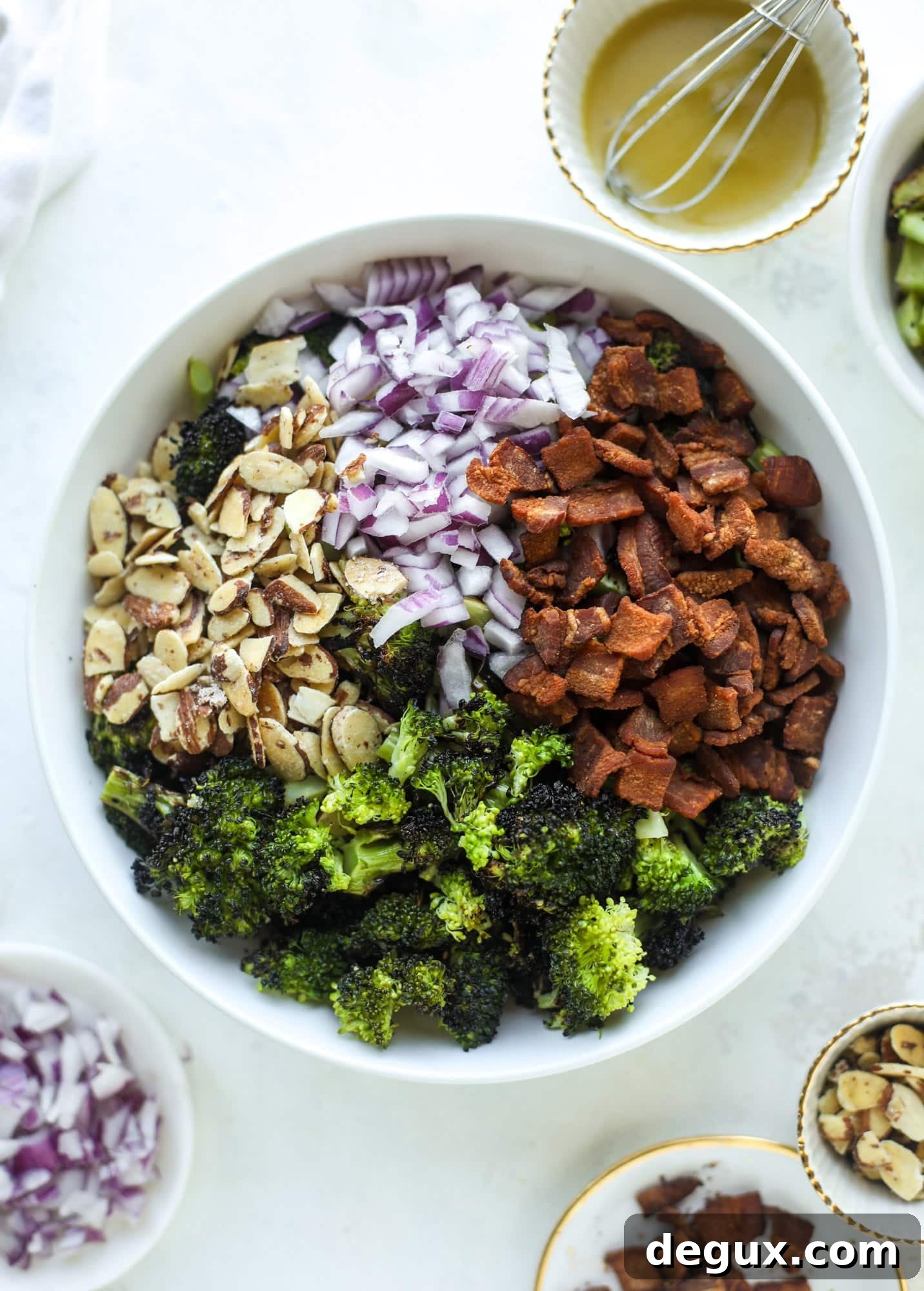 My favorite broccoli salad is here! This broccoli crunch salad is full of grilled broccoli, sliced almonds, diced scallions and crunchy bacon. It's so good!
