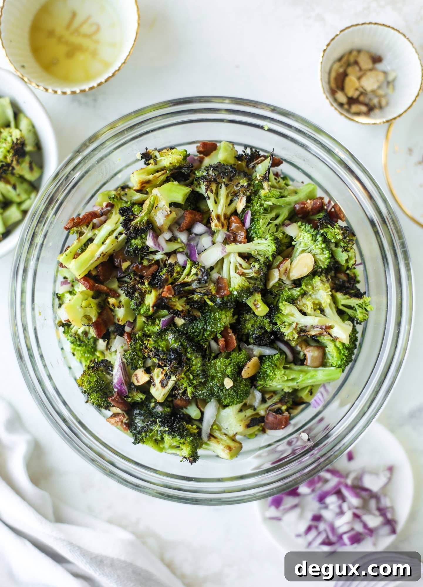 My favorite broccoli salad is here! This broccoli crunch salad is full of grilled broccoli, sliced almonds, diced scallions and crunchy bacon. It's so good!
