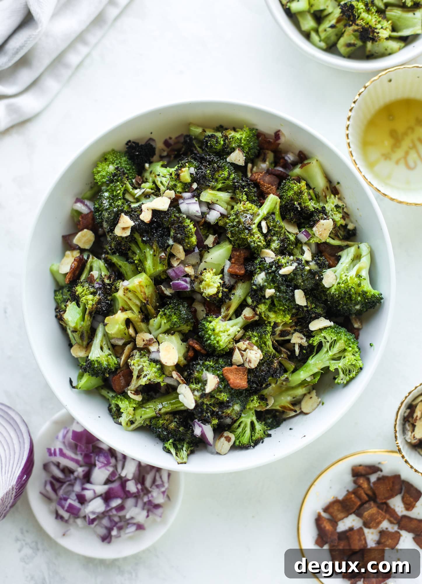 My favorite broccoli salad is here! This broccoli crunch salad is full of grilled broccoli, sliced almonds, diced scallions and crunchy bacon. It's so good!
