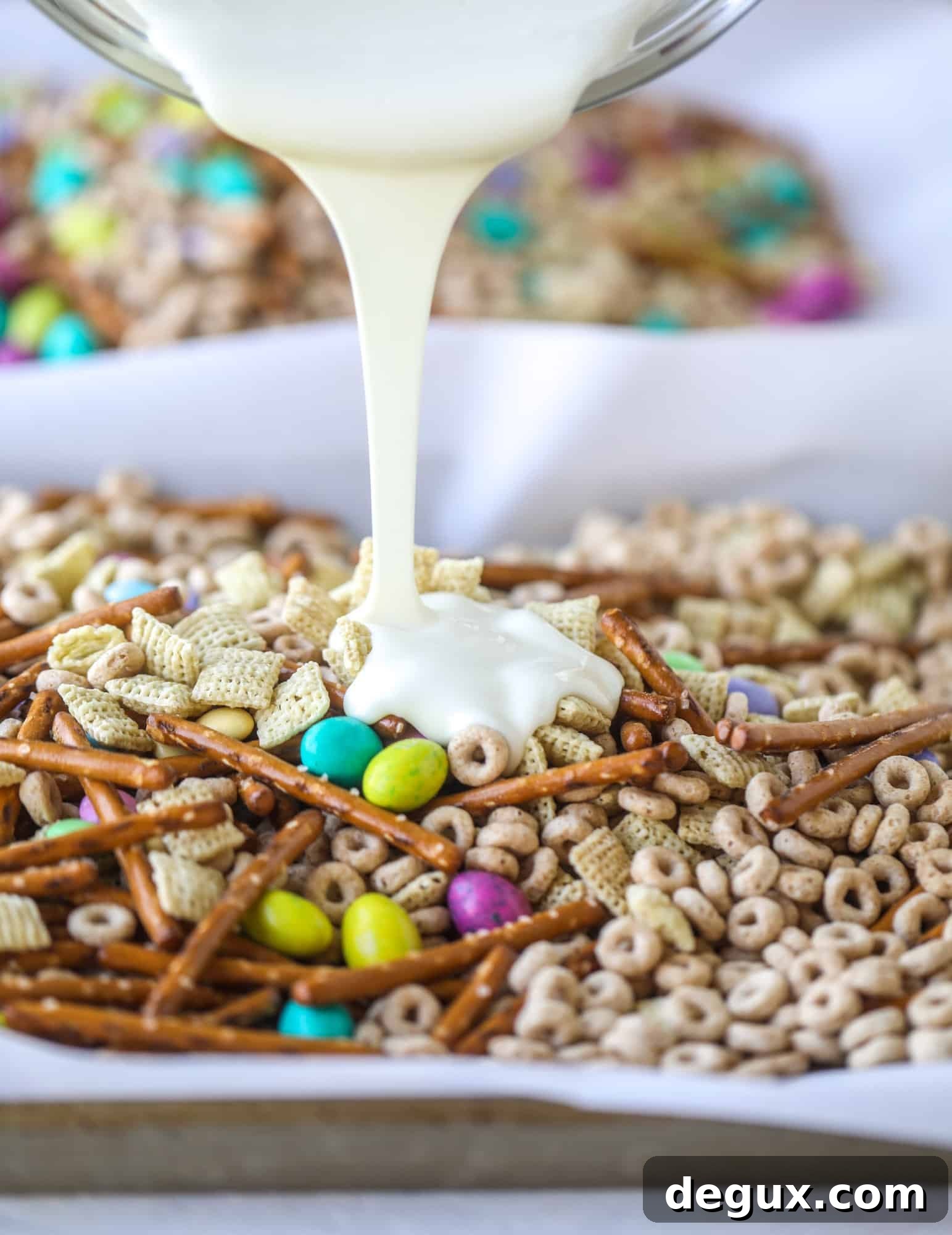 Adorable Easter Snack Mix Ideas for Kids and Parties 4 white chocolate drizzle on easter snack mix
