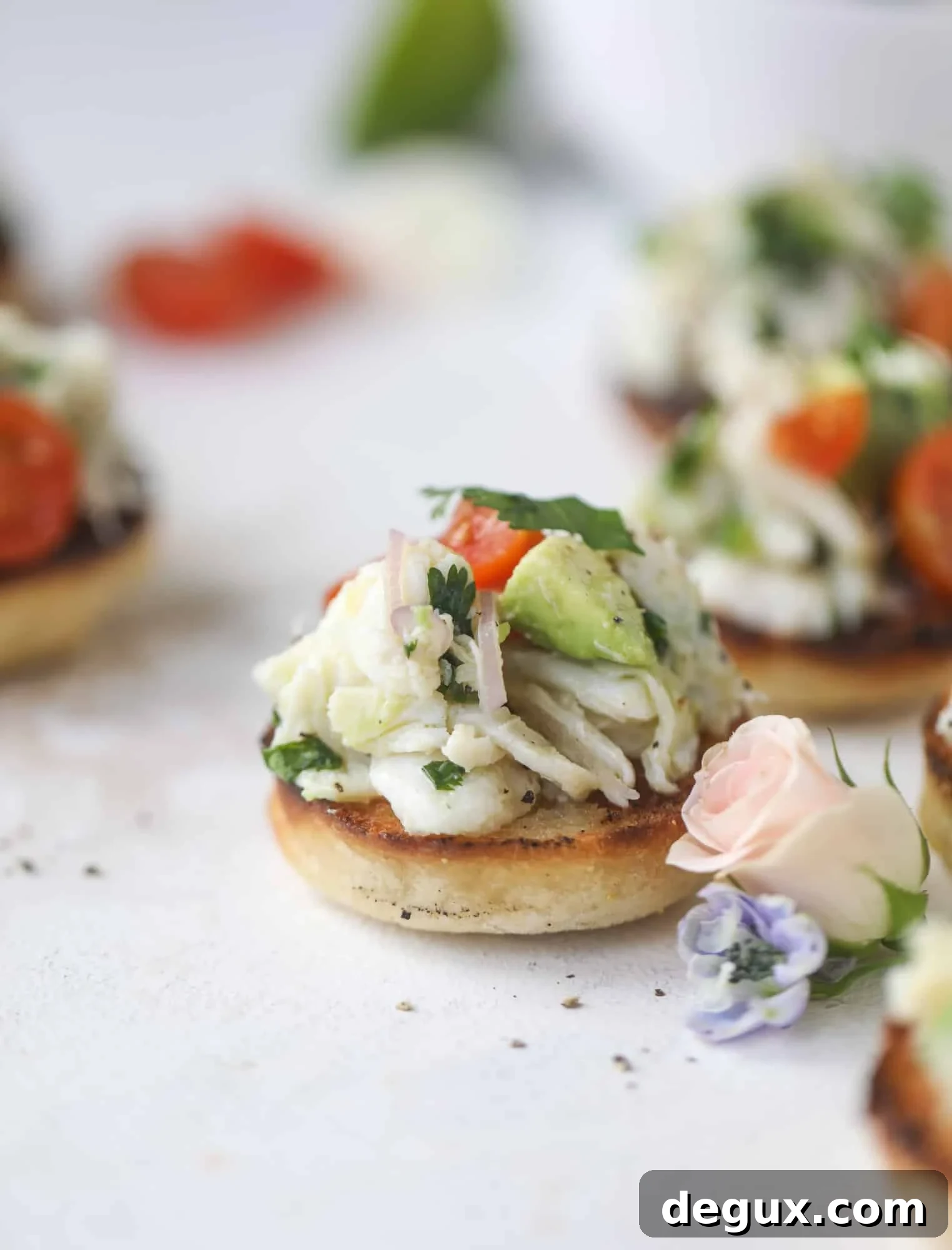 Crab and Avocado Salad on Garlic Butter Toast 2 The cutest crab salad toasts are perfect for a snack, appetizer or light meal with a greens salad. This avocado crab salad is so refreshing and light!