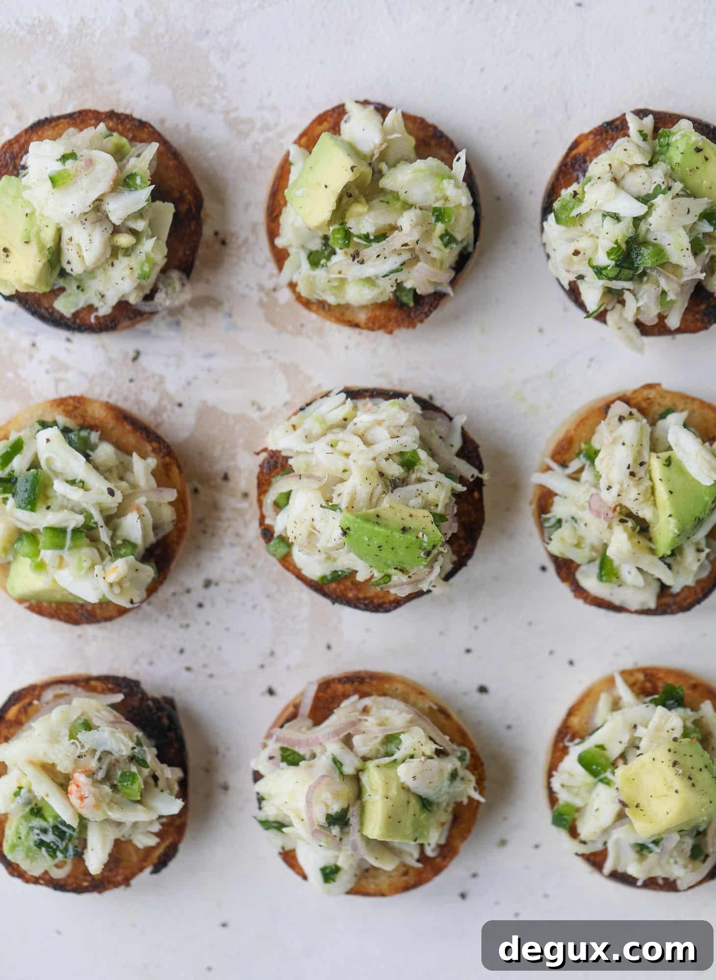 Crab and Avocado Salad on Garlic Butter Toast 5 The cutest crab salad toasts are perfect for a snack, appetizer or light meal with a greens salad. This avocado crab salad is so refreshing and light!