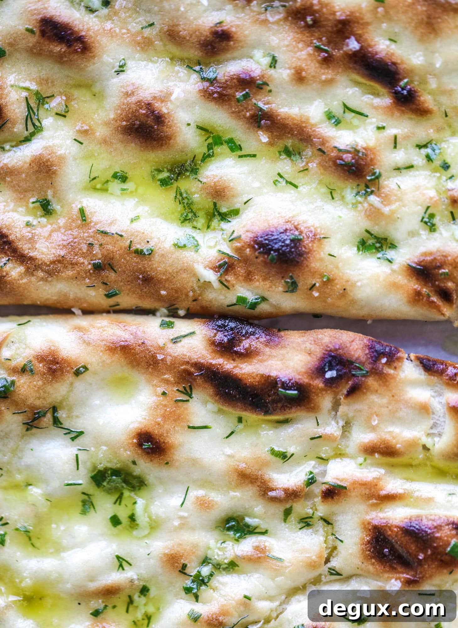 Caramelized Onion & Garlic Butter Grilled Focaccia Recipe 6 Grilled focaccia bread is such a treat! Topped with puddles of garlic butter, fresh chopped herbs and golden, caramelized onions, it's a slice of heaven.