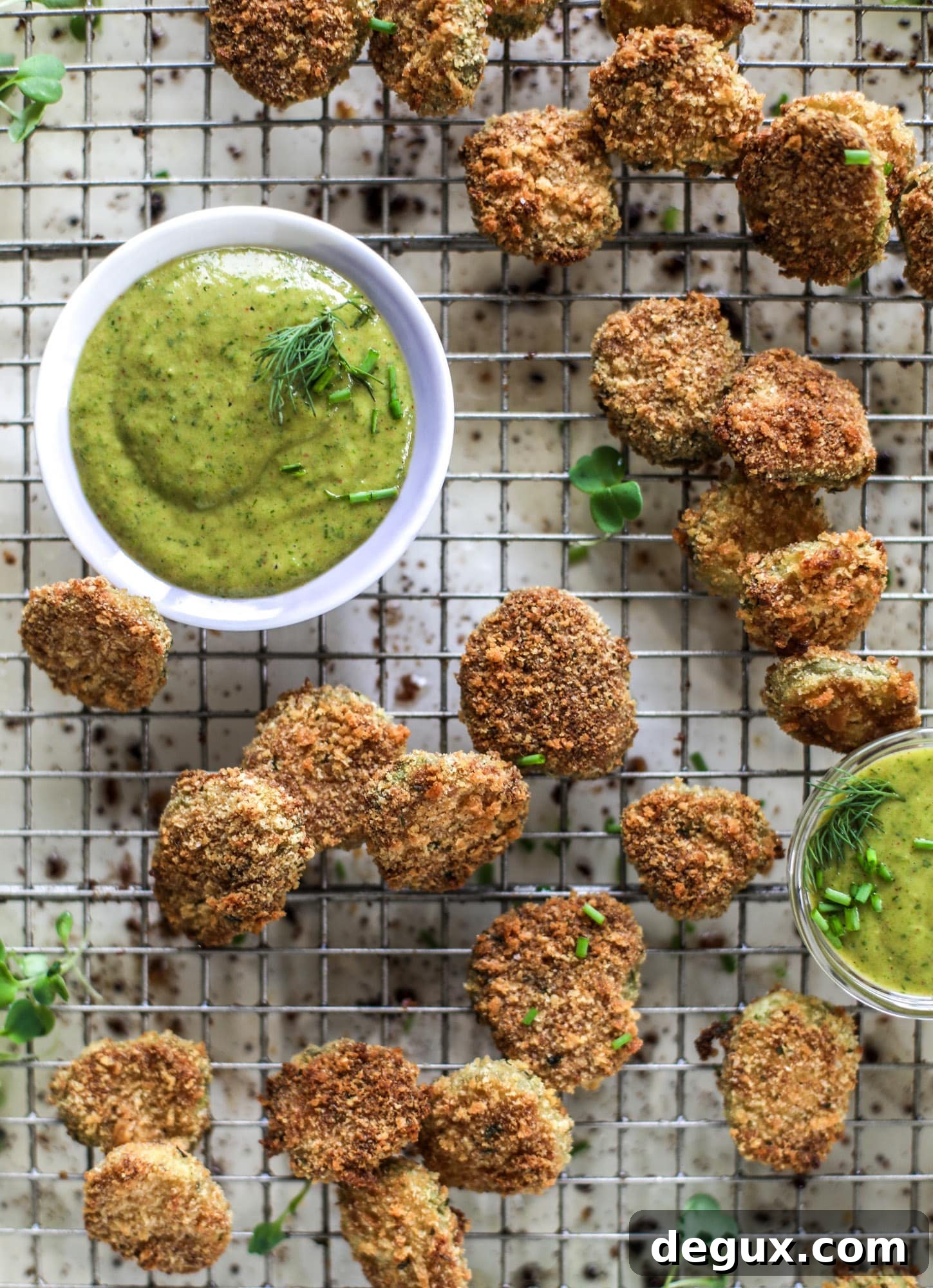 Crispy Oven-Fried Pickles with Green Goddess Ranch Dip 2 Oven fried crispy pickles are super crunchy and delicious! Served with a dairy free green goddess ranch dip, they are the best snack ever.