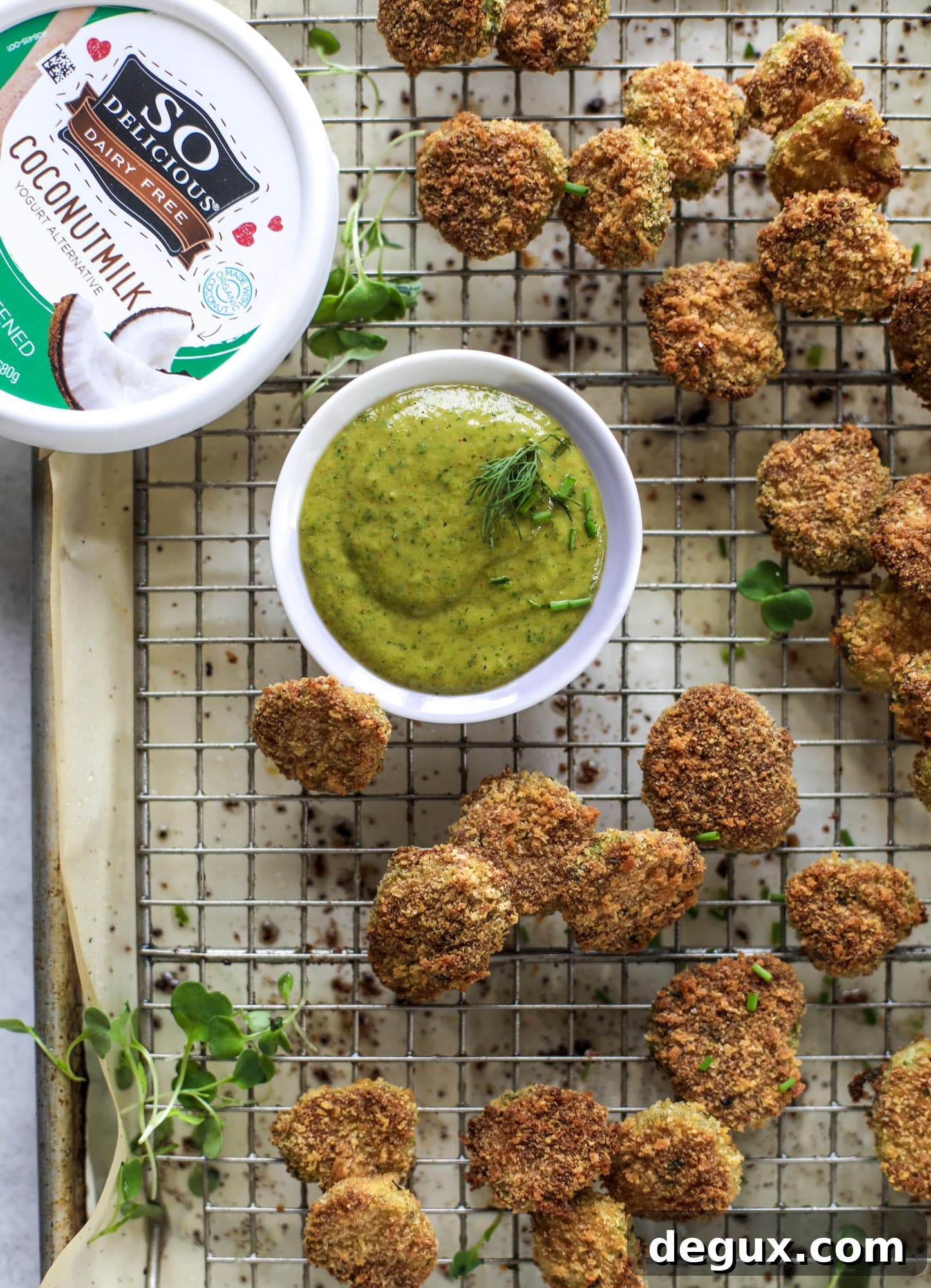 Crispy Oven-Fried Pickles with Green Goddess Ranch Dip 6 Oven fried crispy pickles are super crunchy and delicious! Served with a dairy free green goddess ranch dip, they are the best snack ever.