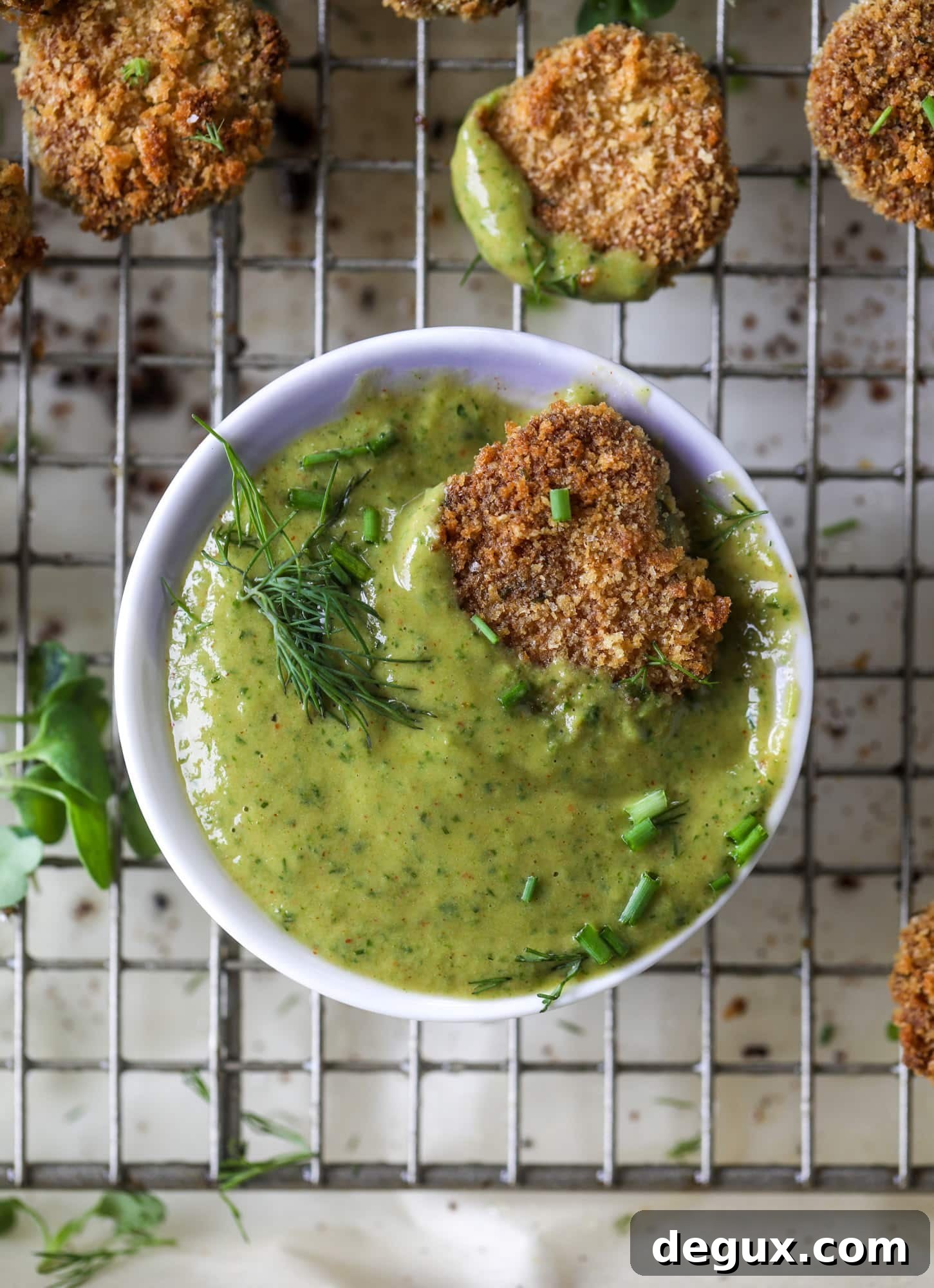 Crispy Oven-Fried Pickles with Green Goddess Ranch Dip 7 Oven fried crispy pickles are super crunchy and delicious! Served with a dairy free green goddess ranch dip, they are the best snack ever.