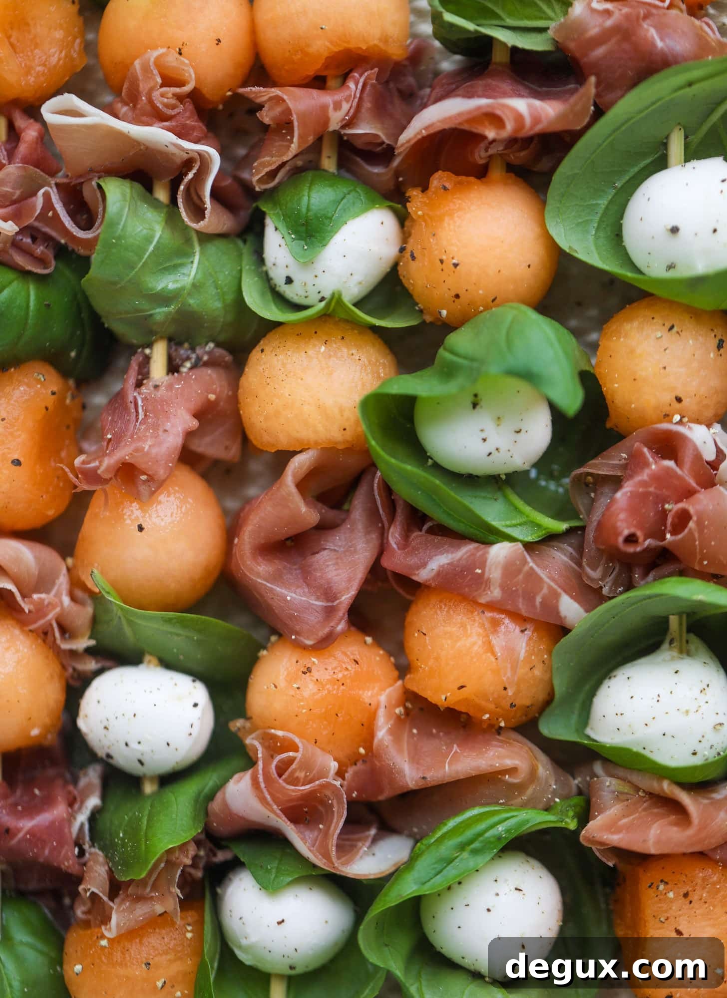 Cantaloupe Prosciutto Caprese Skewers with Lemon-Mint Pesto 3 cantaloupe, prosciutto, mozzarella skewers