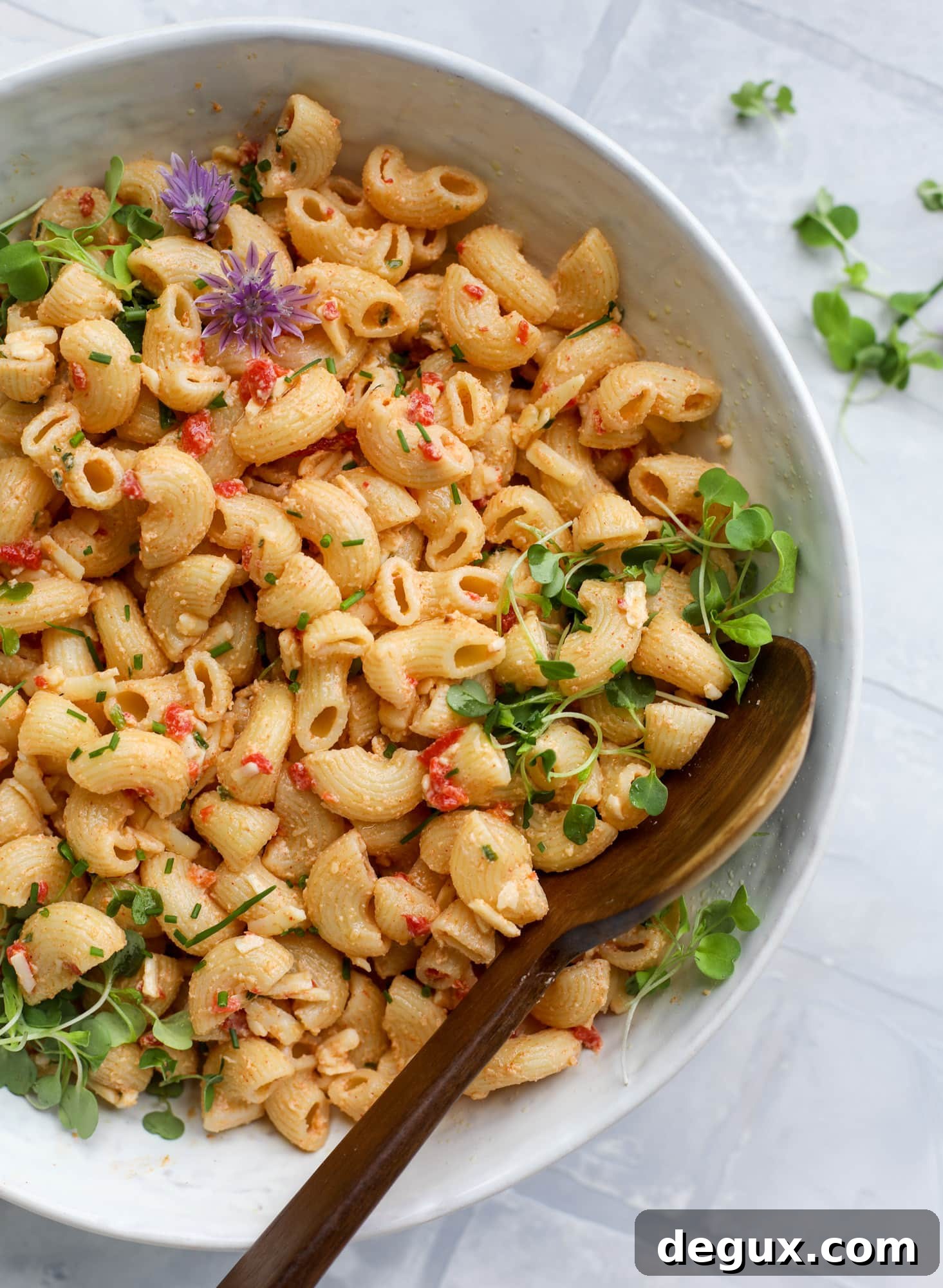 This pimento cheese pasta salad is the perfect summer side dish! All the flavor of pimento cheese and all the comforts of pasta salad, in one bowl!