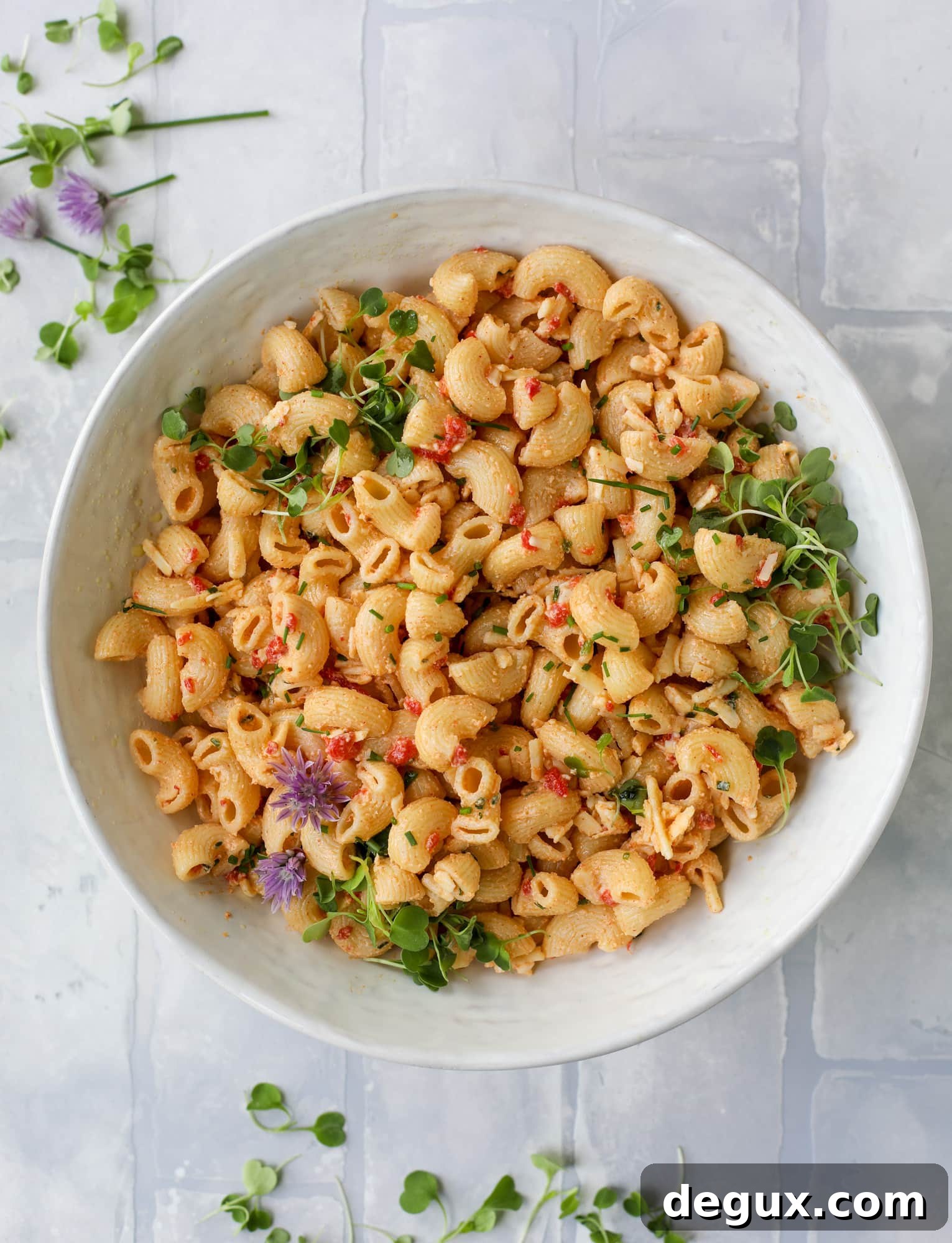 This pimento cheese pasta salad is the perfect summer side dish! All the flavor of pimento cheese and all the comforts of pasta salad, in one bowl!