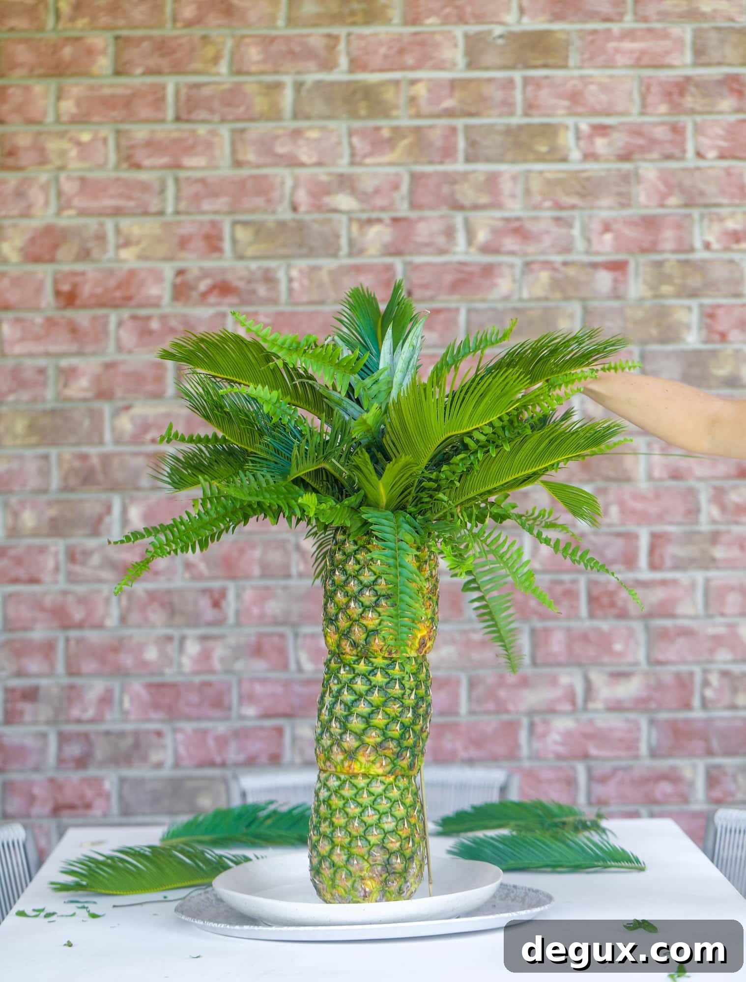 Create a Pineapple Palm Tree Fruit Tray: Step-by-Step Guide 5 adding the ferns!