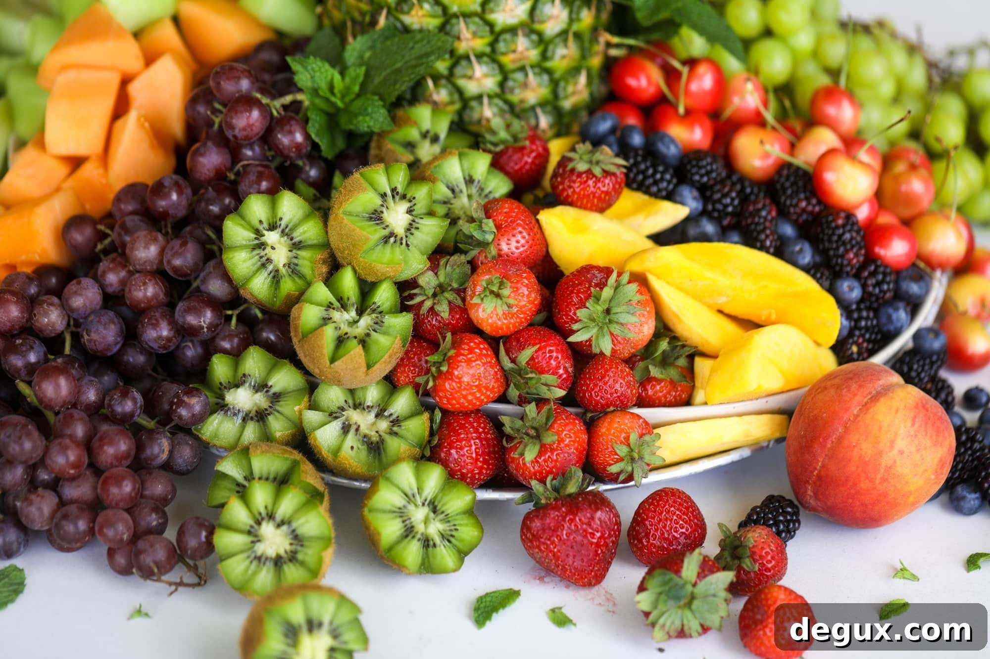 Create a Pineapple Palm Tree Fruit Tray: Step-by-Step Guide 9 This is the cutest way to display fruit! A pineapple palm tree fruit tray will be the star of the show at your next summer BBQ or party!