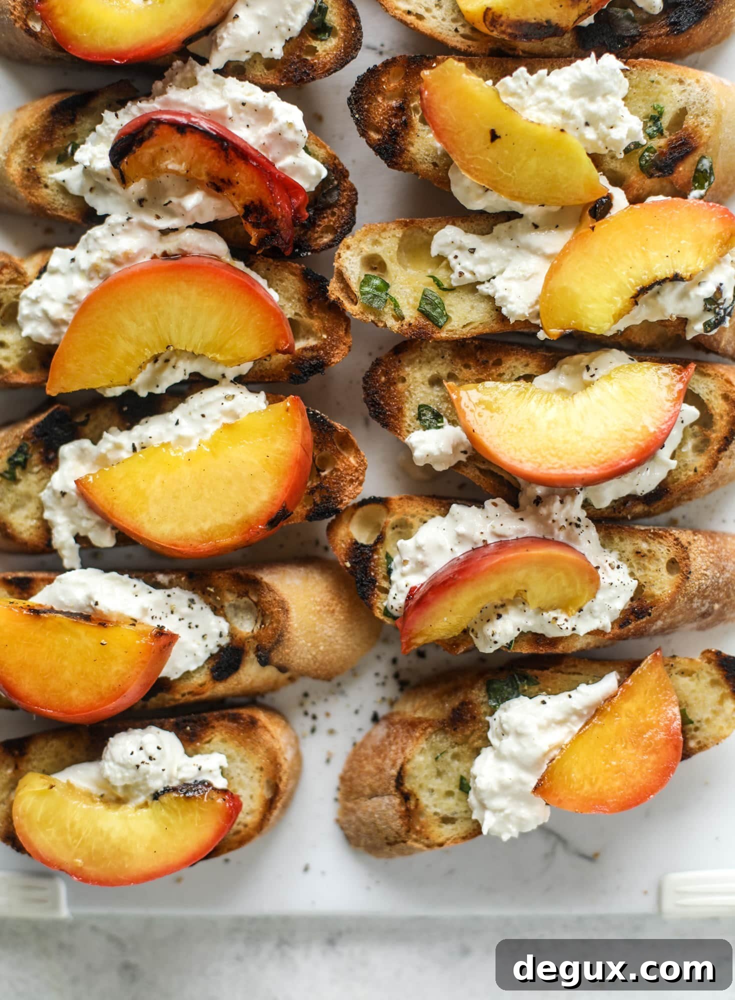 Burrata, Peach & Pancetta Crostini with Basil Butter 5 This peach burrata crostini is the best summer appetizer! it starts with grilled basil butter toasts that are topped with burrata, peach and pancetta!