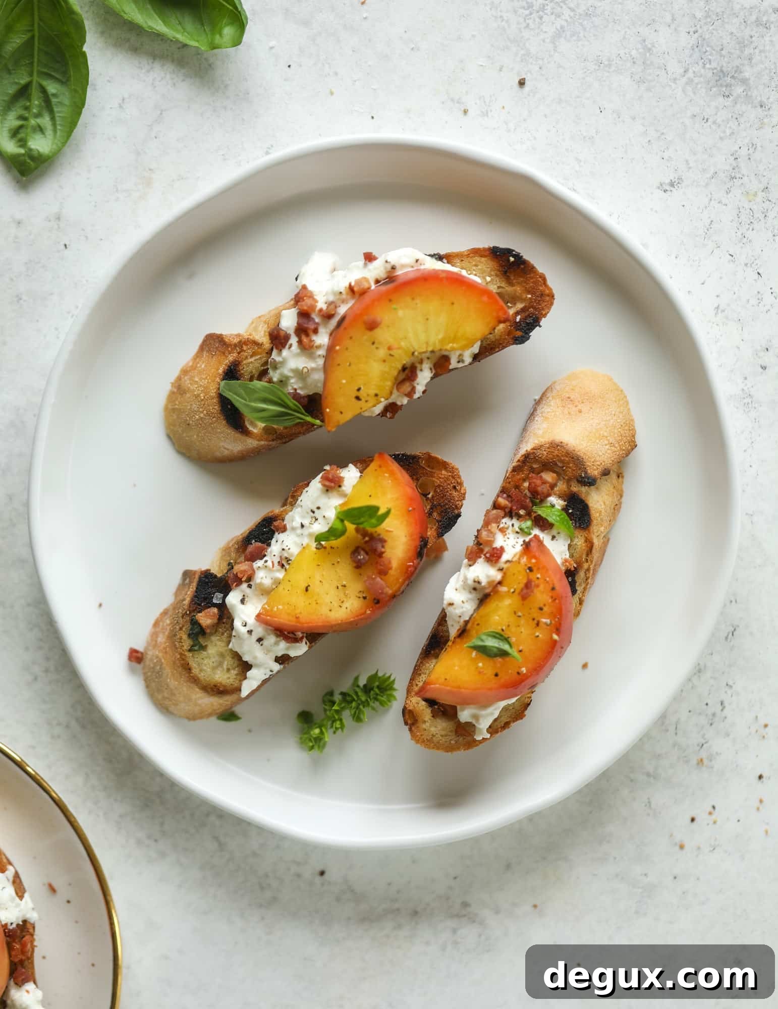 Burrata, Peach & Pancetta Crostini with Basil Butter 6 This peach burrata crostini is the best summer appetizer! it starts with grilled basil butter toasts that are topped with burrata, peach and pancetta!