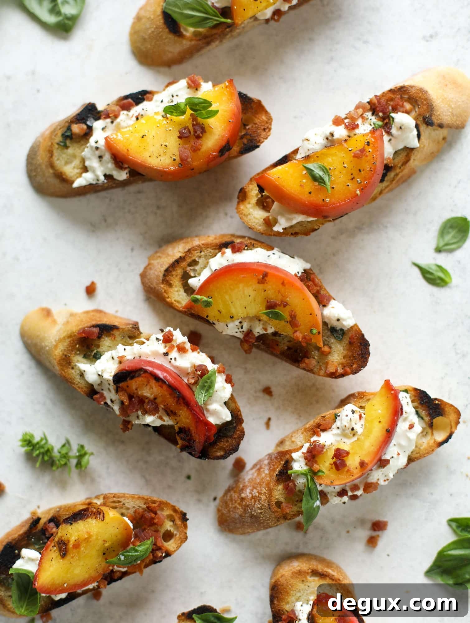 Burrata, Peach & Pancetta Crostini with Basil Butter 7 This peach burrata crostini is the best summer appetizer! it starts with grilled basil butter toasts that are topped with burrata, peach and pancetta!