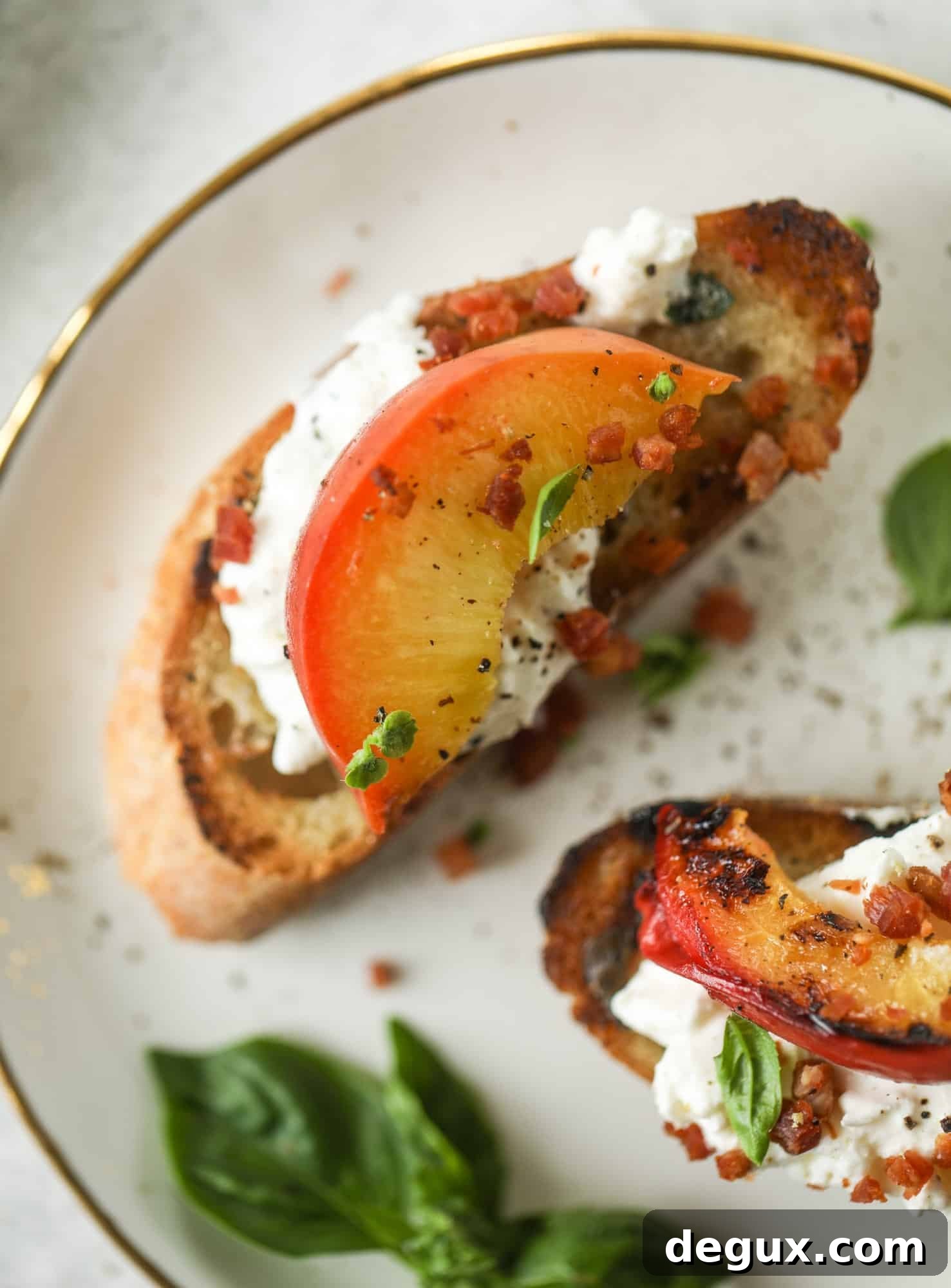 Burrata, Peach & Pancetta Crostini with Basil Butter 9 This peach burrata crostini is the best summer appetizer! it starts with grilled basil butter toasts that are topped with burrata, peach and pancetta!
