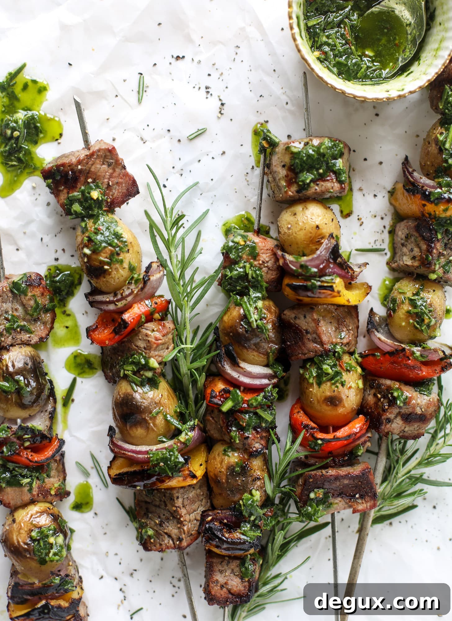 Grilled Filet and Potato Skewers with Rosemary Chimichurri Sauce 9 These steak and potato skewers are a complete meal in one! Serve with chimichurri for the ultimate flavor explosion. These are delicious!