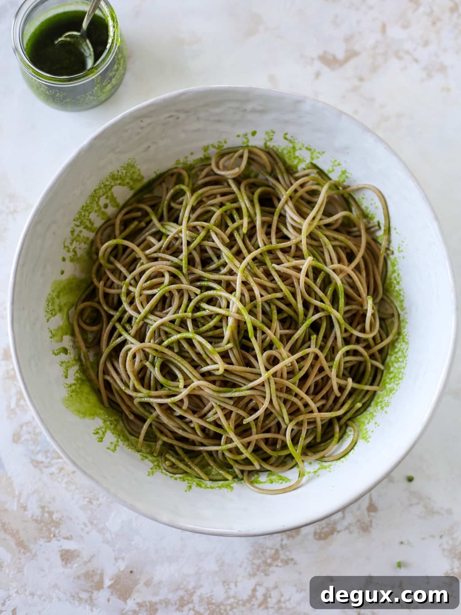 spaghetti tossed in basil oil