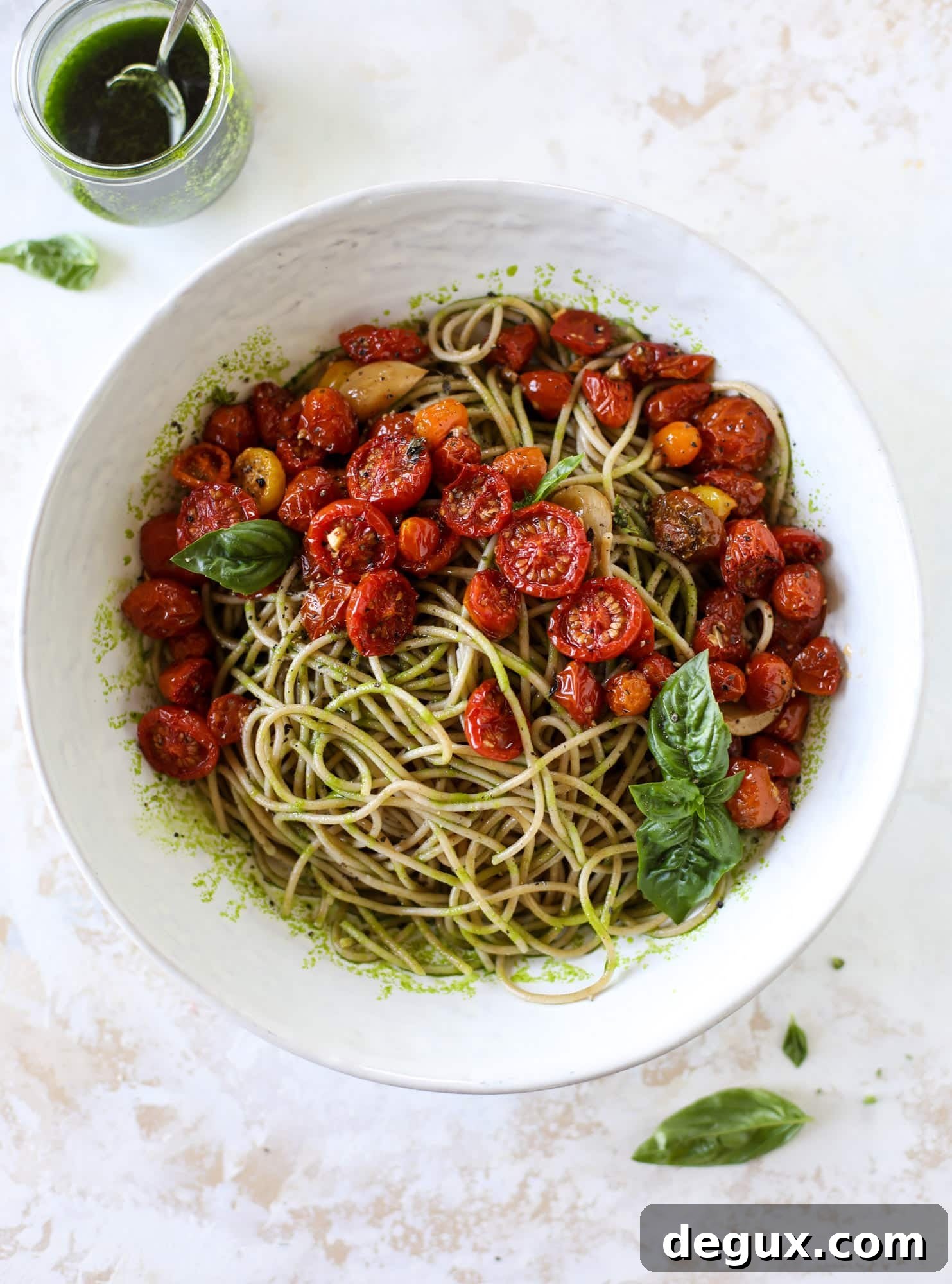 This tomato basil pasta is a labor of love! Made with slow roasted tomatoes, basil oil and tons of parmesan, it's ridiculously full of flavor.