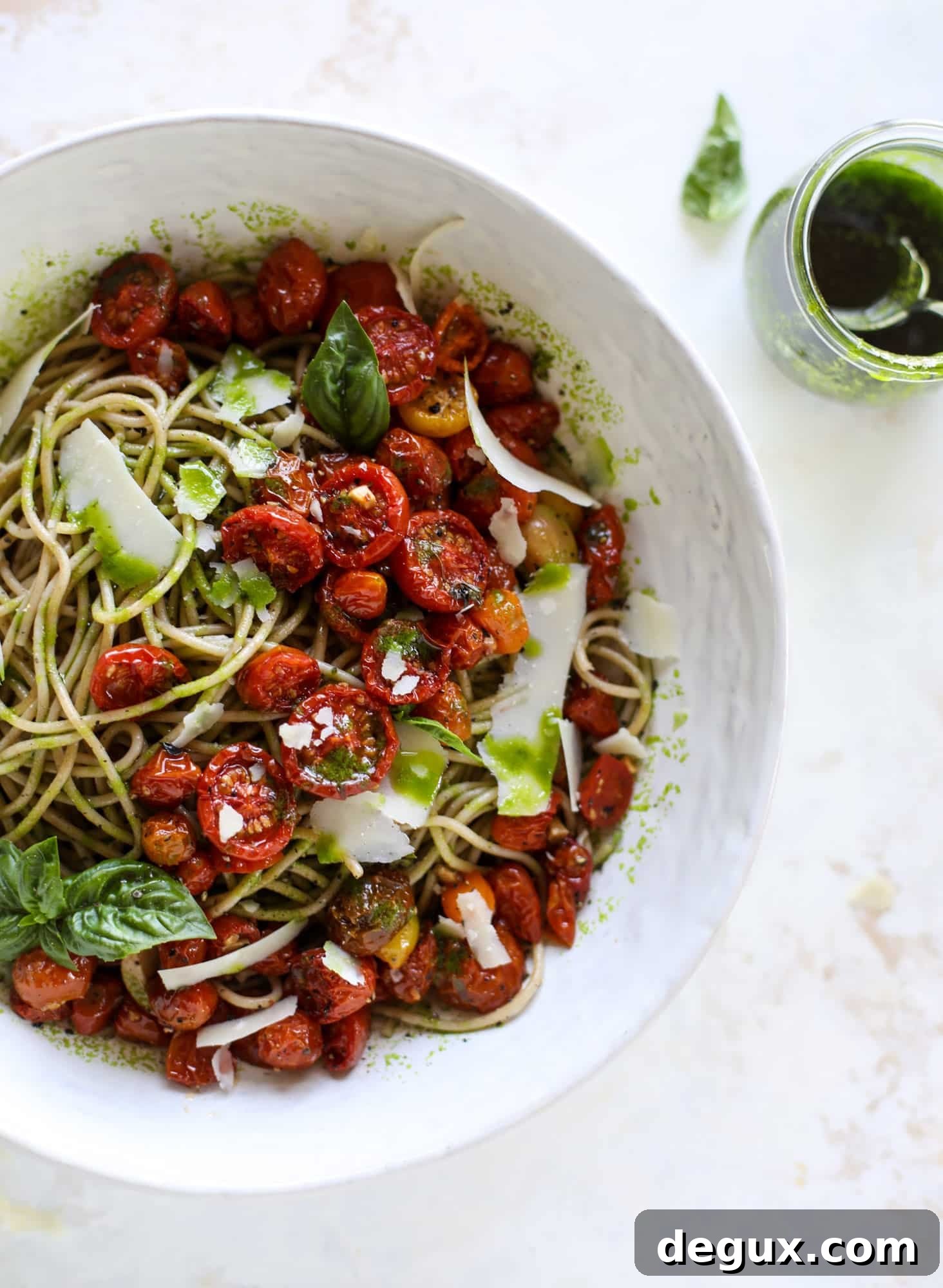 This tomato basil pasta is a labor of love! Made with slow roasted tomatoes, basil oil and tons of parmesan, it's ridiculously full of flavor.