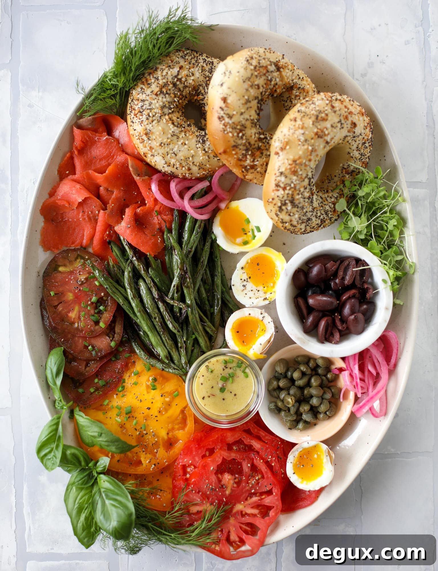 These nicoise bagels are a spin on my favorite salad! Loaded with smoked salmon, blistered green beans and tons of goodness. They are delish!
