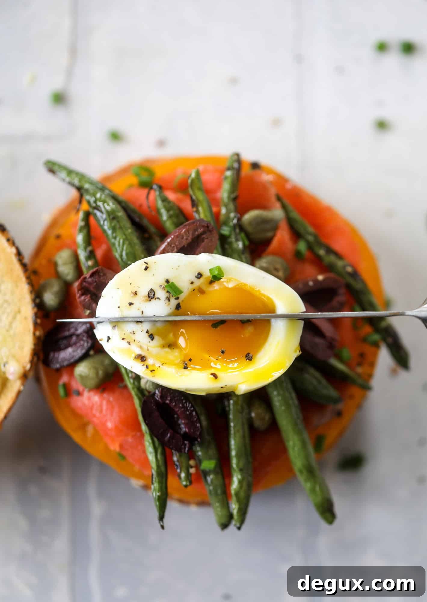 These nicoise bagels are a spin on my favorite salad! Loaded with smoked salmon, blistered green beans and tons of goodness. They are delish!