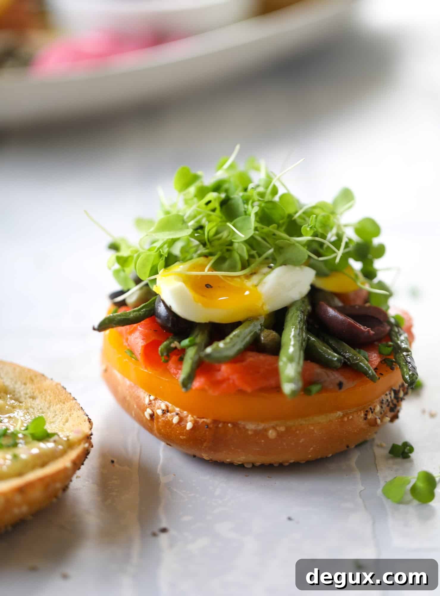 These nicoise bagels are a spin on my favorite salad! Loaded with smoked salmon, blistered green beans and tons of goodness. They are delish!