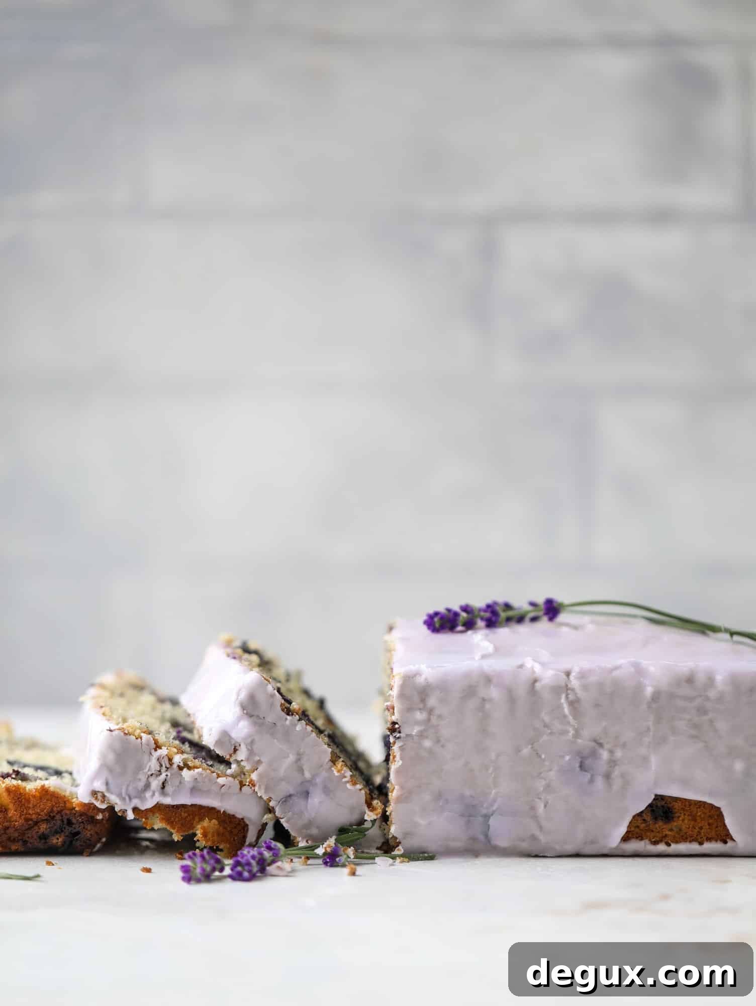 This lovely blueberry ricotta cake is covered in a lavender glaze and the perfect recipe for blueberry season! It's rich and light and super flavorful.