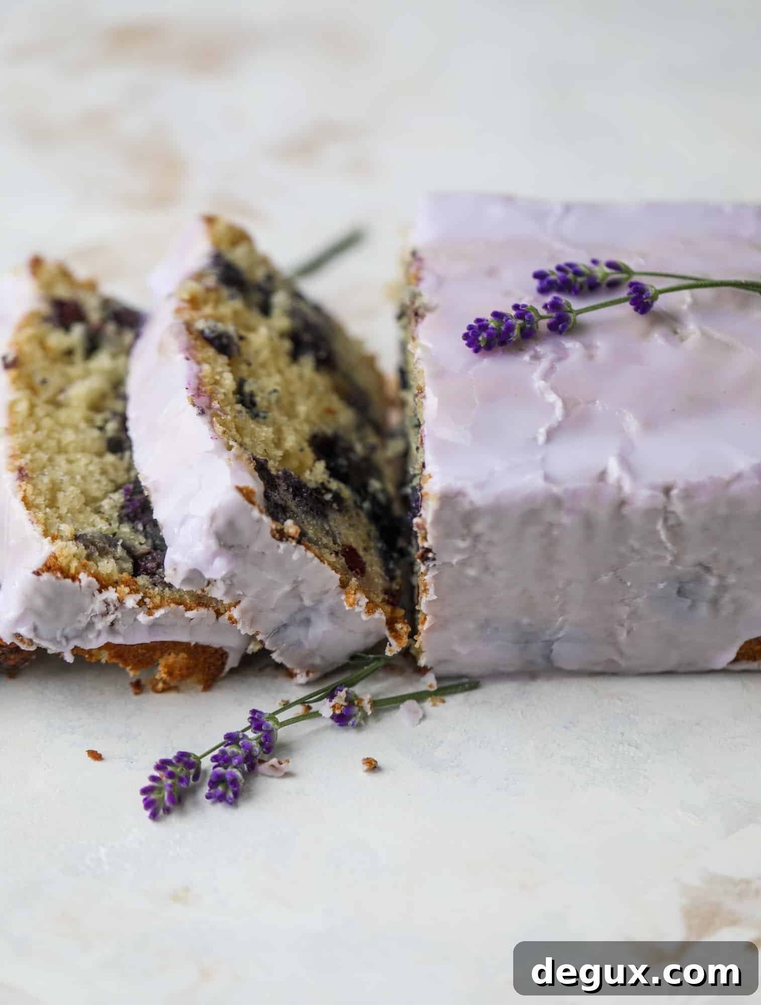 This lovely blueberry ricotta cake is covered in a lavender glaze and the perfect recipe for blueberry season! It's rich and light and super flavorful.