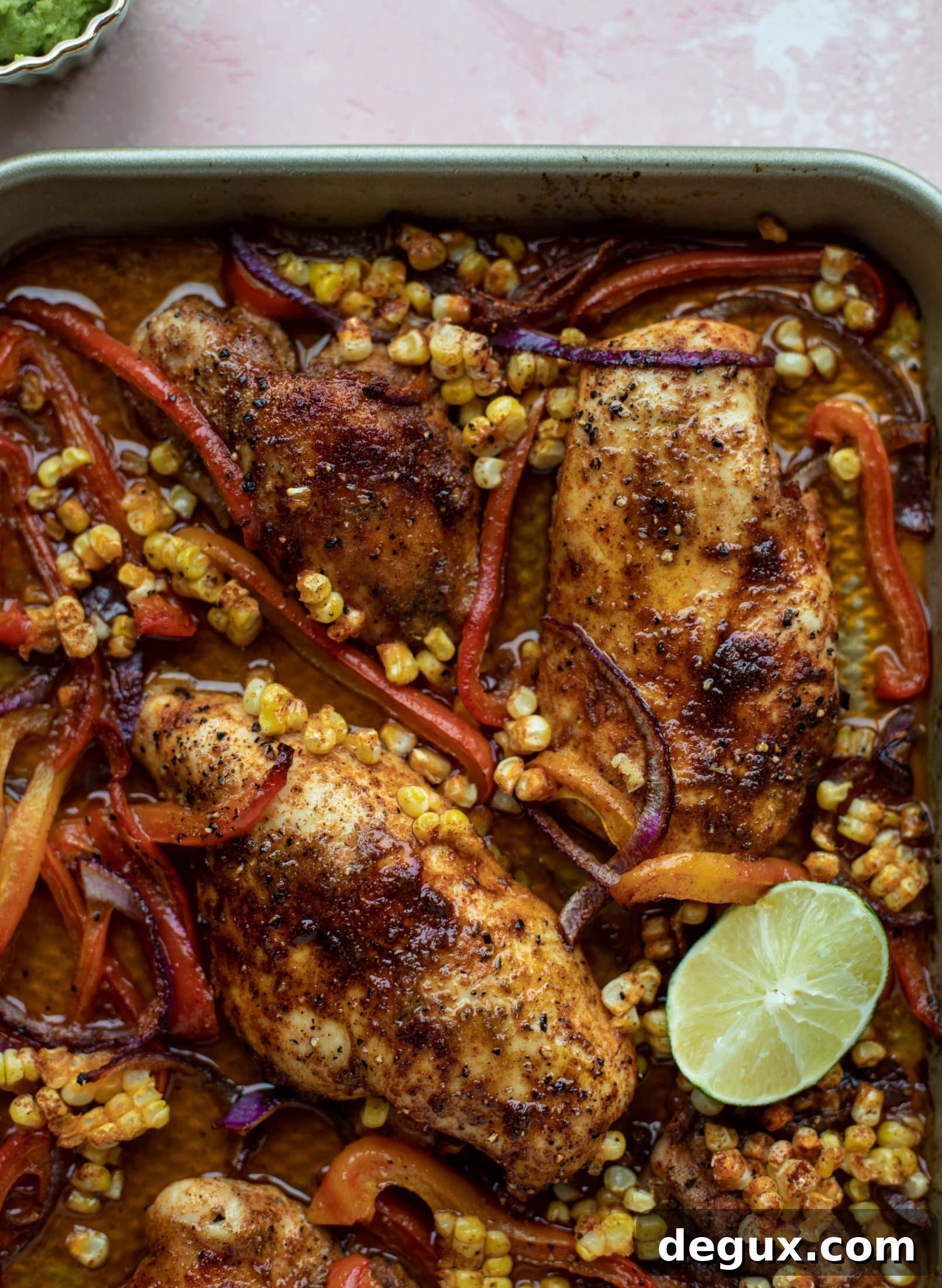 This sheet pan nacho chicken recipe results in the juiciest, more flavorful chicken that can be served in a multitude of ways!