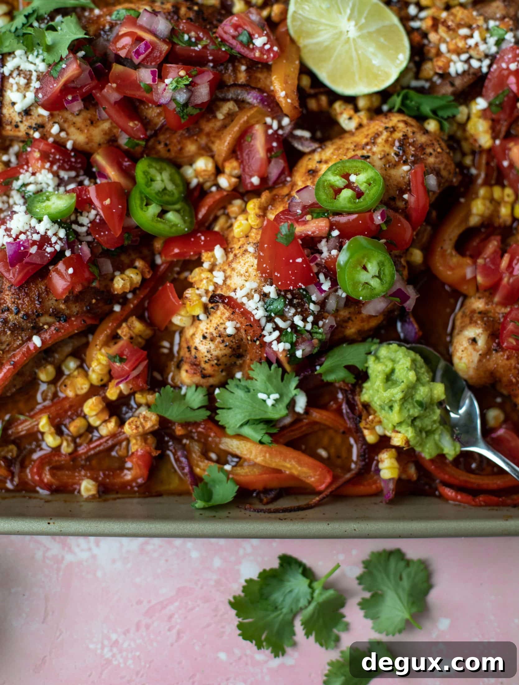 This sheet pan nacho chicken recipe results in the juiciest, more flavorful chicken that can be served in a multitude of ways!