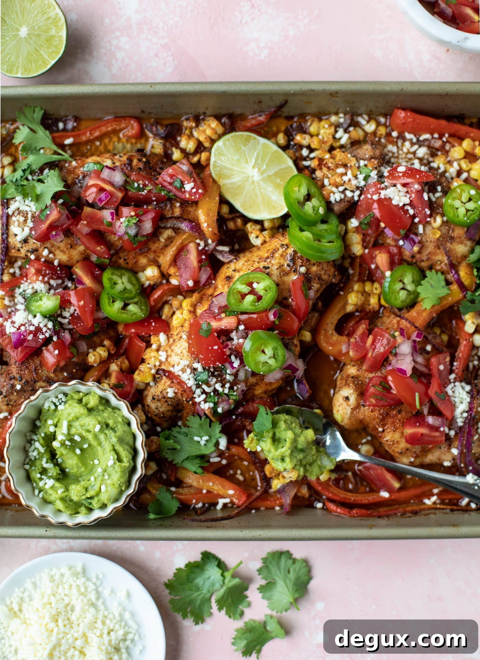 This sheet pan nacho chicken recipe results in the juiciest, more flavorful chicken that can be served in a multitude of ways!