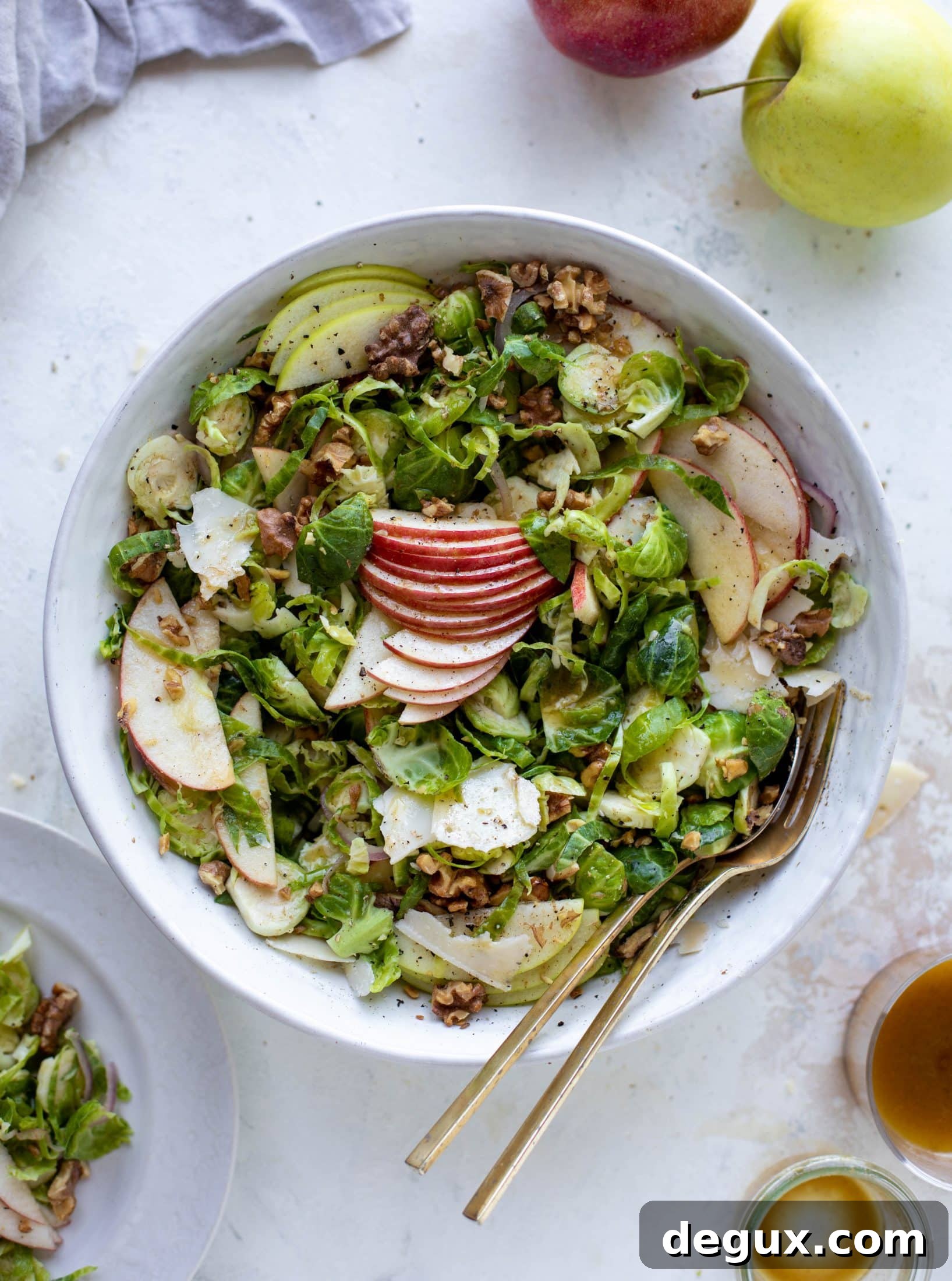 Crispy Brussels Sprout Salad with Brown Butter Vinaigrette 7 This crunchy brussels sprouts apple salad is filled with sprouts, apples, shallots, cinnamon toasted walnuts and drizzled with a brown butter dressing.
