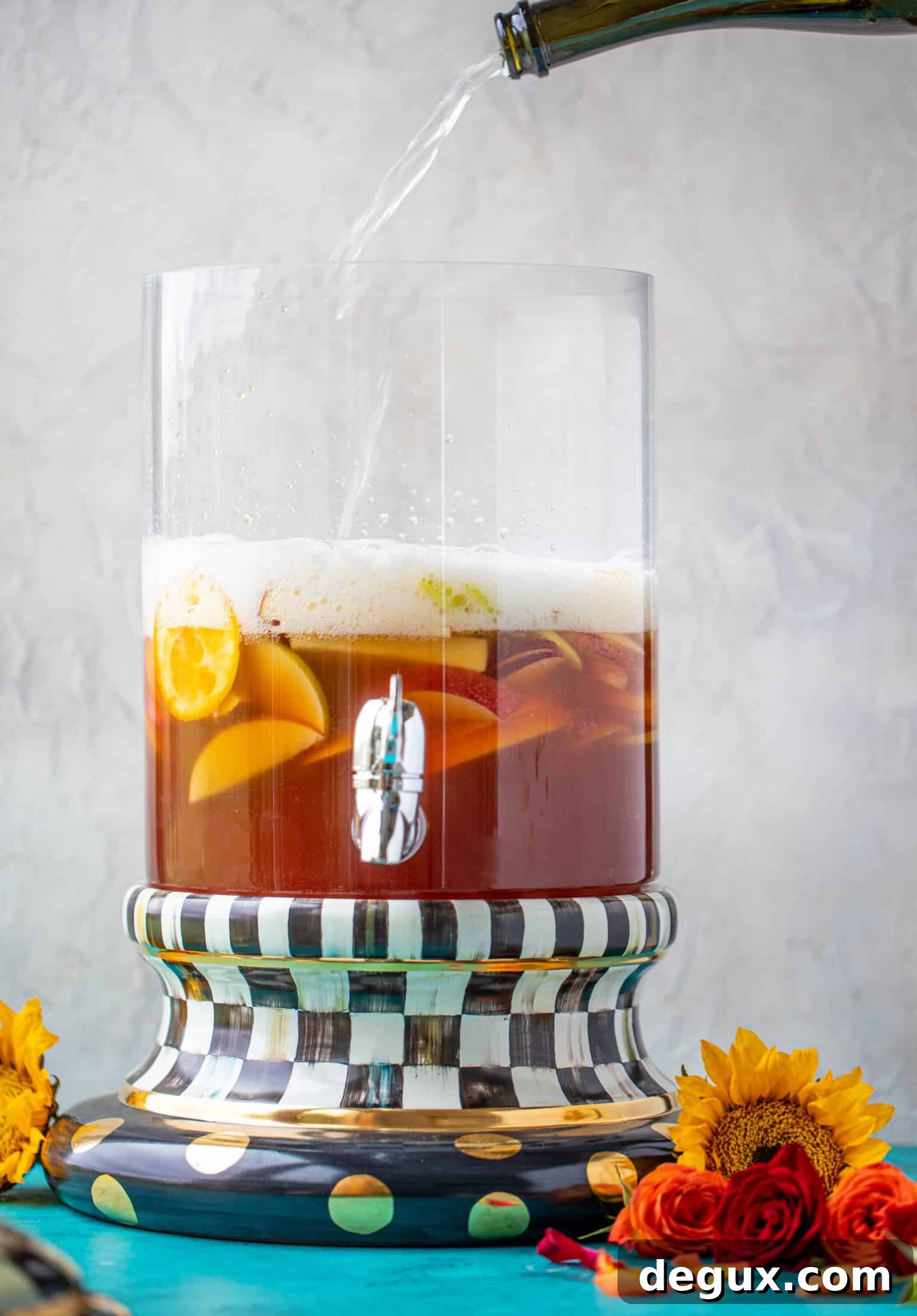 This apple cider punch recipe has tons of fall flavor! Apple cider, aperol, pomegranate soda and prosecco come together to create a bubbly treat!
