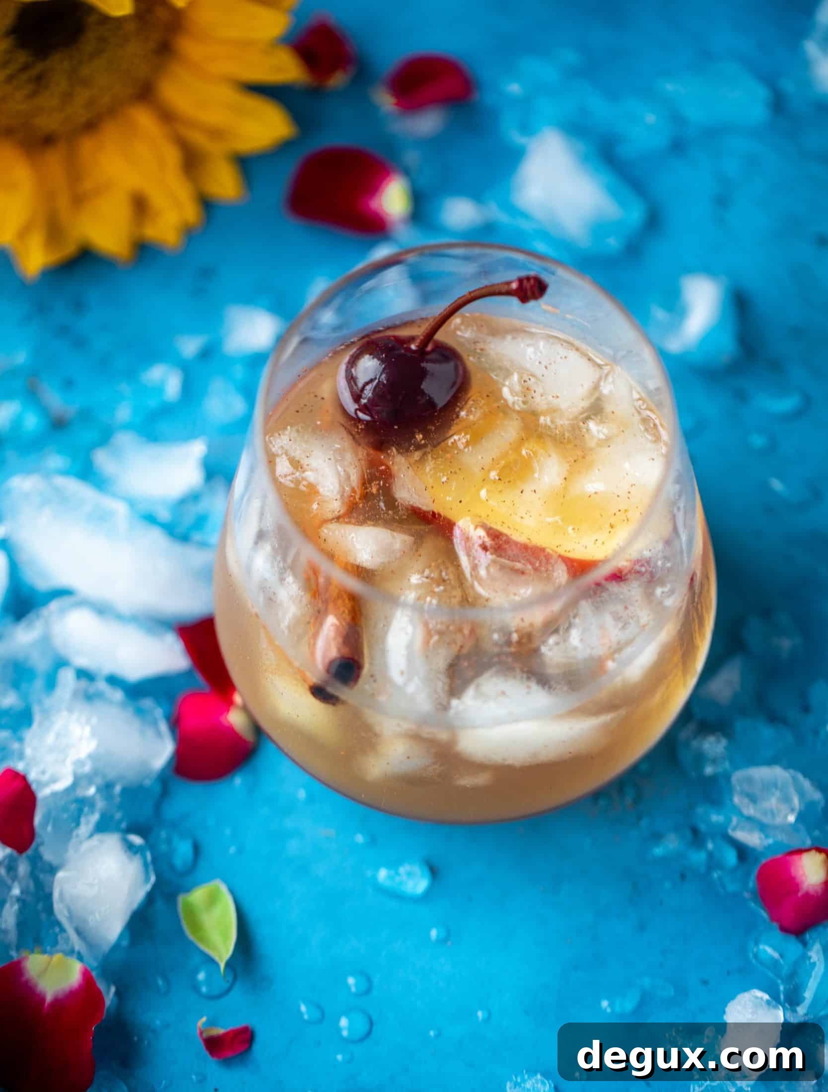 Everything I love about fall is in one little cocktail right here! If you love whiskey, this cinnamon spiced cider and splash of maple makes a sour so good!