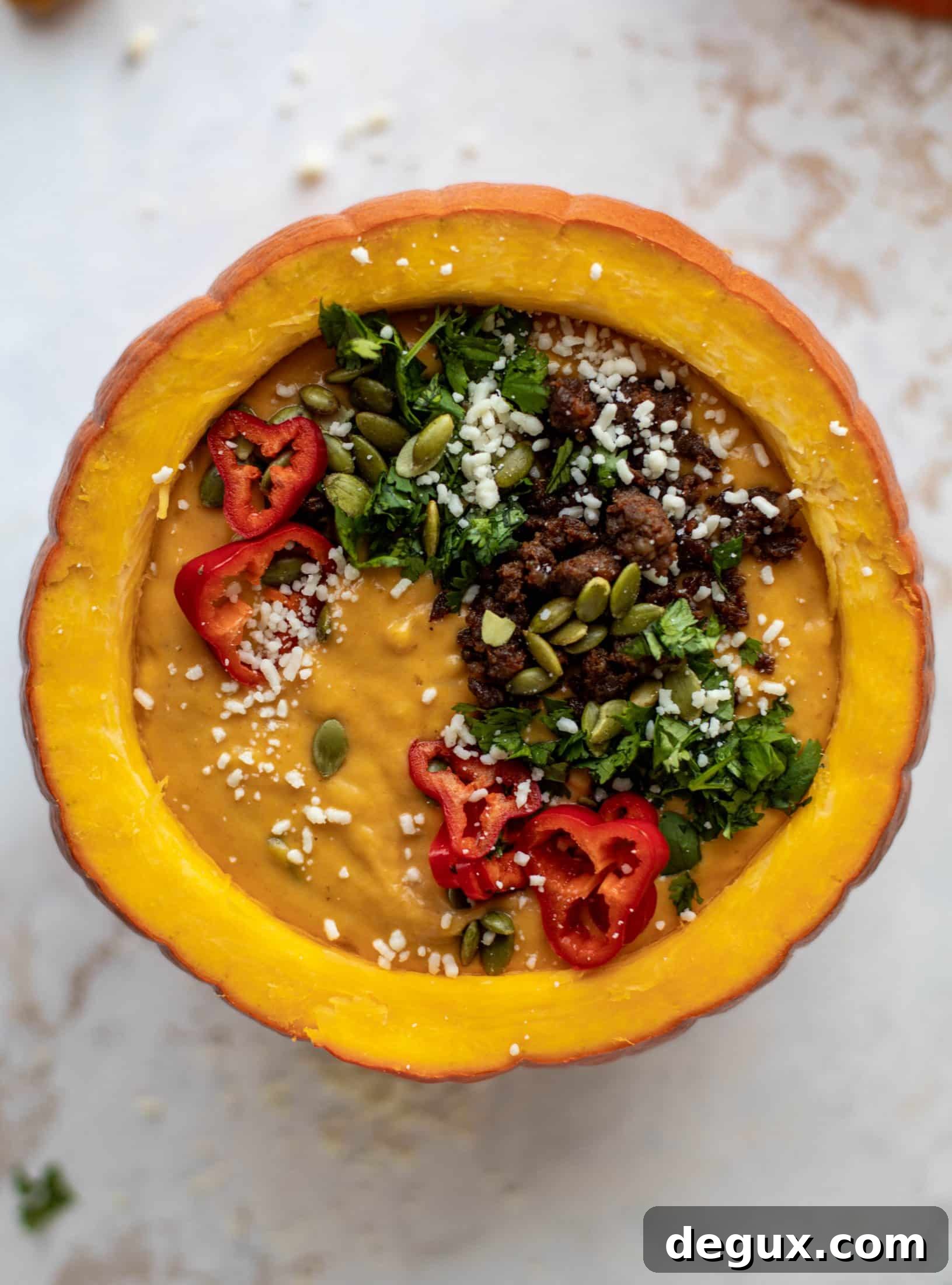 Pumpkin Queso Fundido Recipe: Creamy Autumn Dip for Parties 5 This pumpkin queso fundido is the perfect indulgence for fall. Warm pumpkin queso topped with chroizo, pepitas and jalapeños. It's delish!