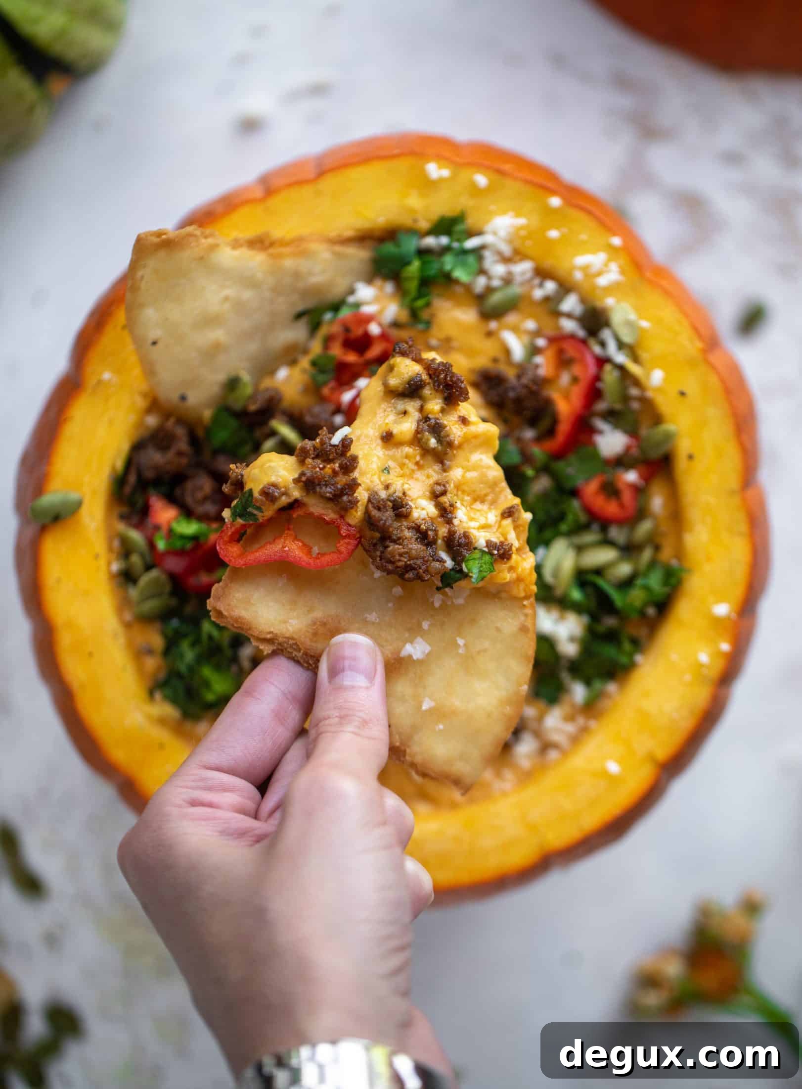 Pumpkin Queso Fundido Recipe: Creamy Autumn Dip for Parties 8 This pumpkin queso fundido is the perfect indulgence for fall. Warm pumpkin queso topped with chroizo, pepitas and jalapeños. It's delish!