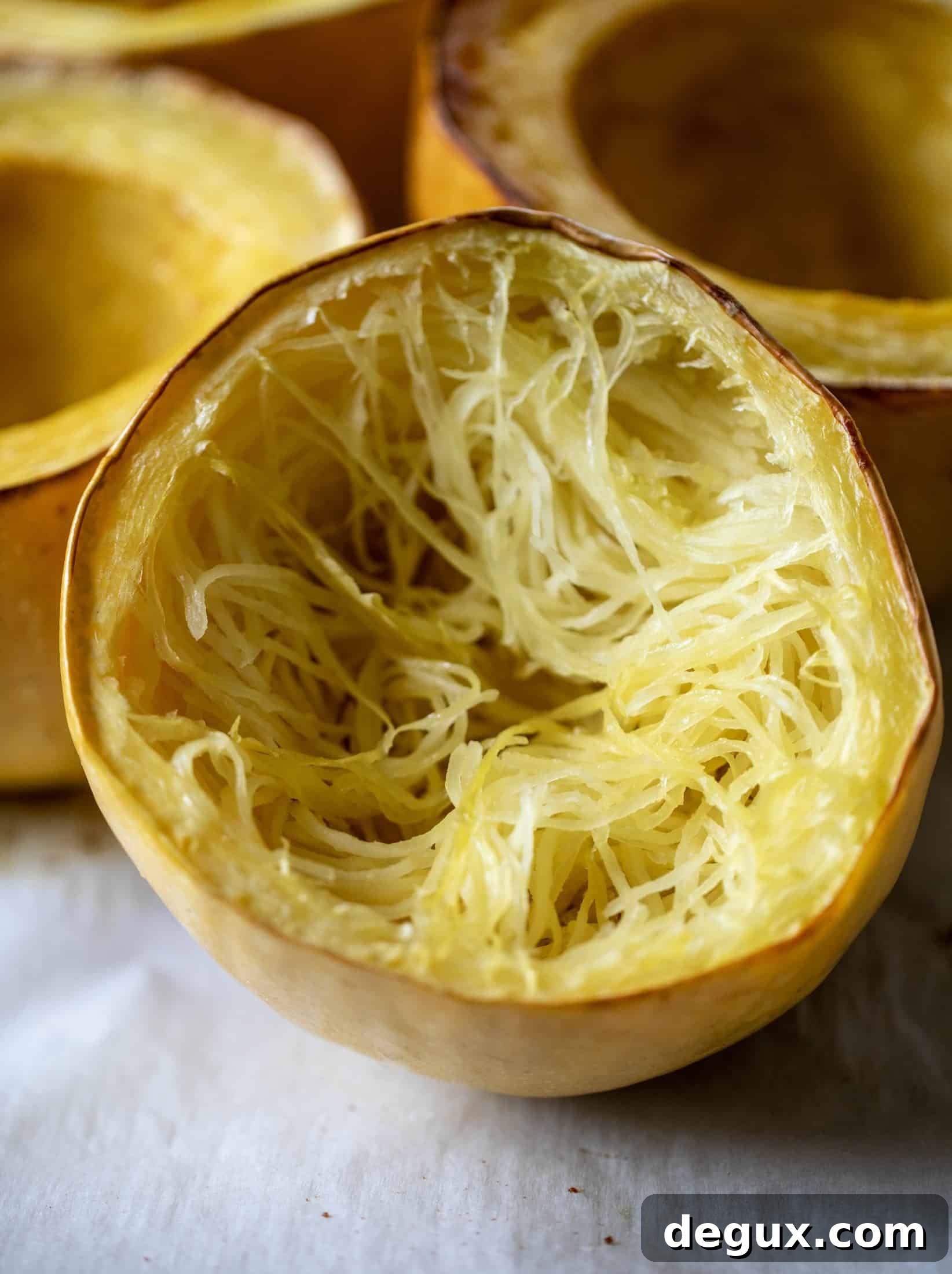 Three-Cheese Spaghetti Squash Bake: Creamy, Savory Dinner 3 roasted spaghetti squash