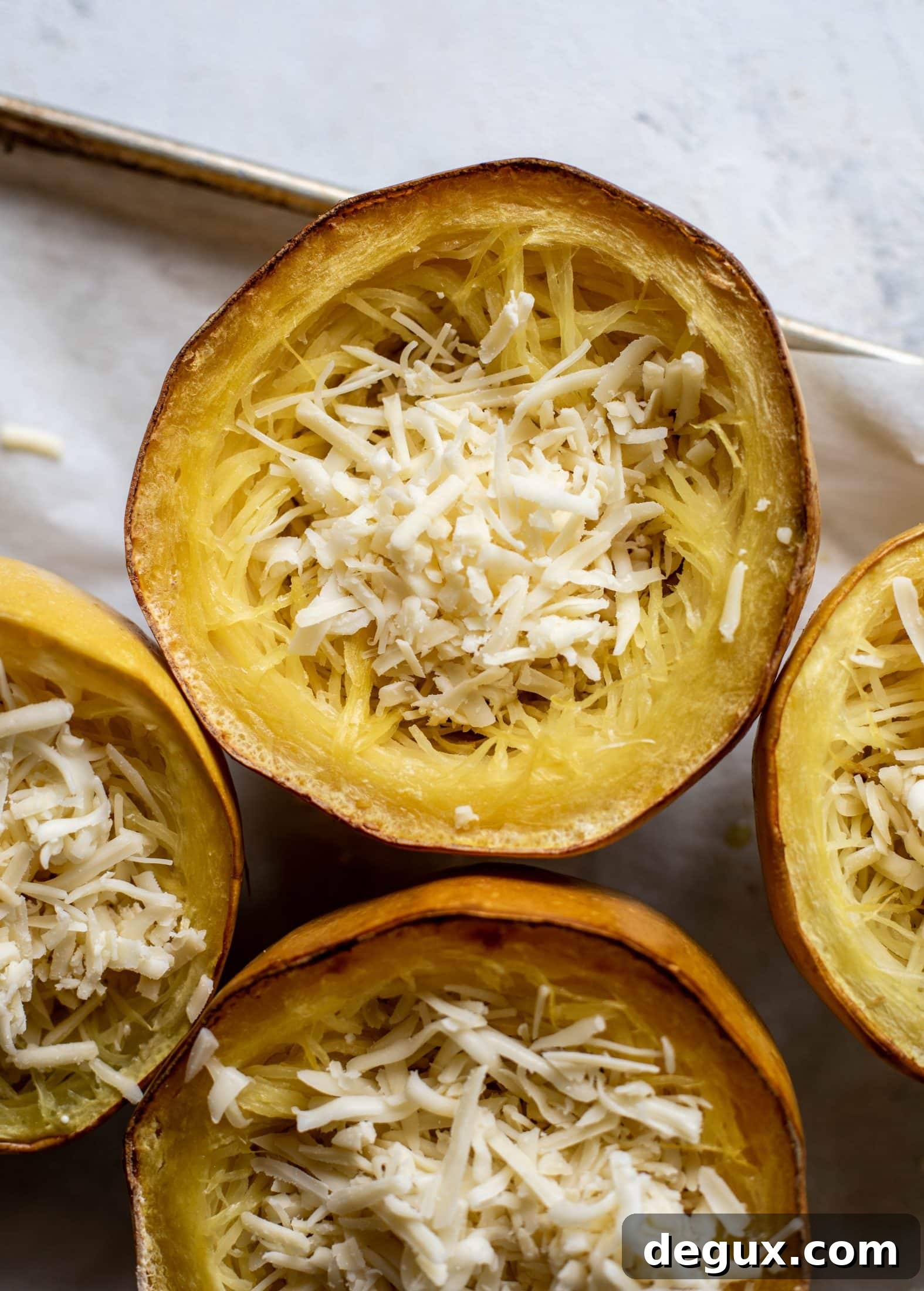 Three-Cheese Spaghetti Squash Bake: Creamy, Savory Dinner 4 Three cheese spaghetti squash in a squash bowl! Squash tossed with fontina, gruyere and parmesan to make a creamy comforting meal.