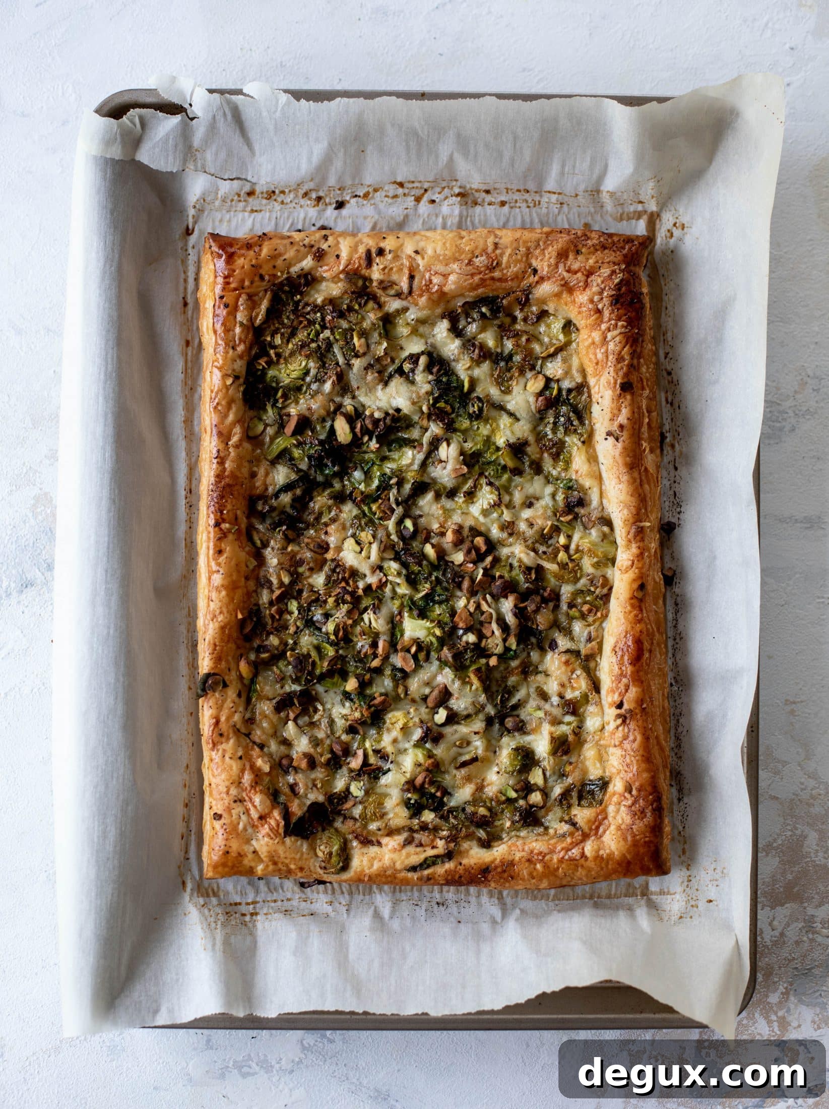 Brussels Sprout, Fontina & Pistachio Puff Pastry Tart 4 This brussels sprouts tart has a ton of flavor! Melty fontina, sliced brussels and crunchy pistachios all on top of puff pastry. Delish!
