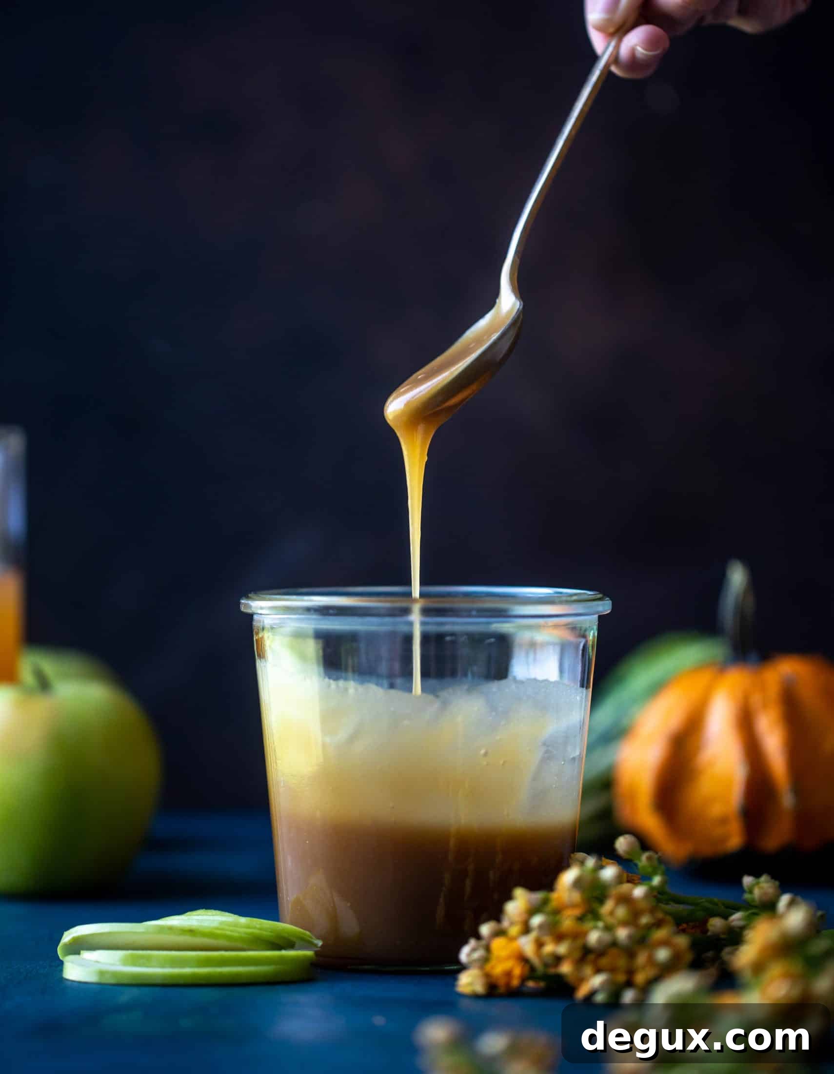 This caramel apple old fashioned will warm you up this fall! Bourbon, homemade cider caramel, apple cider and bitters make this super delish.