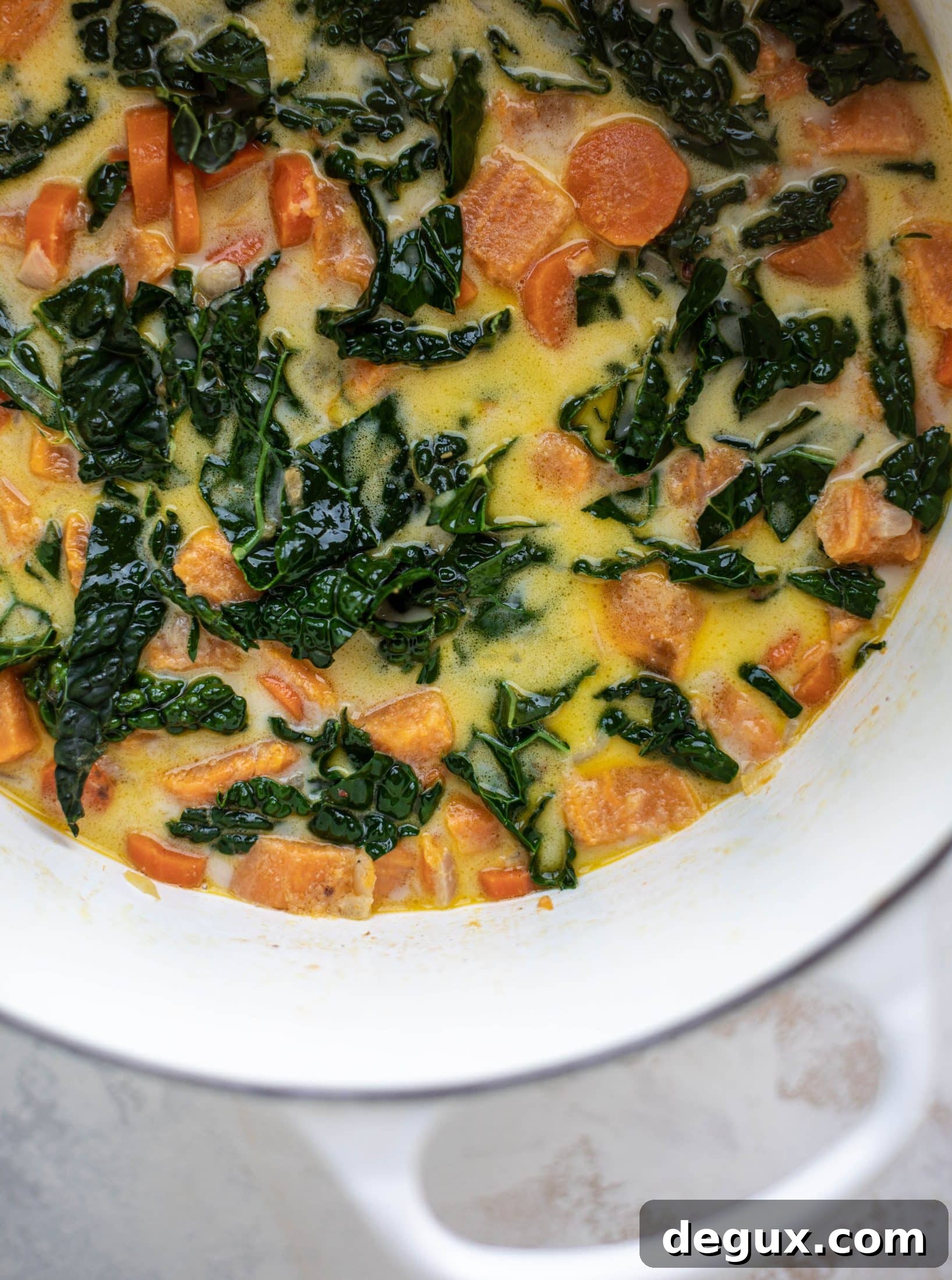 This sweet potato chowder is a hug in a bowl! Made with lots of greens and crunchy pancetta and pepitas for topping, it's a perfect weeknight meal.