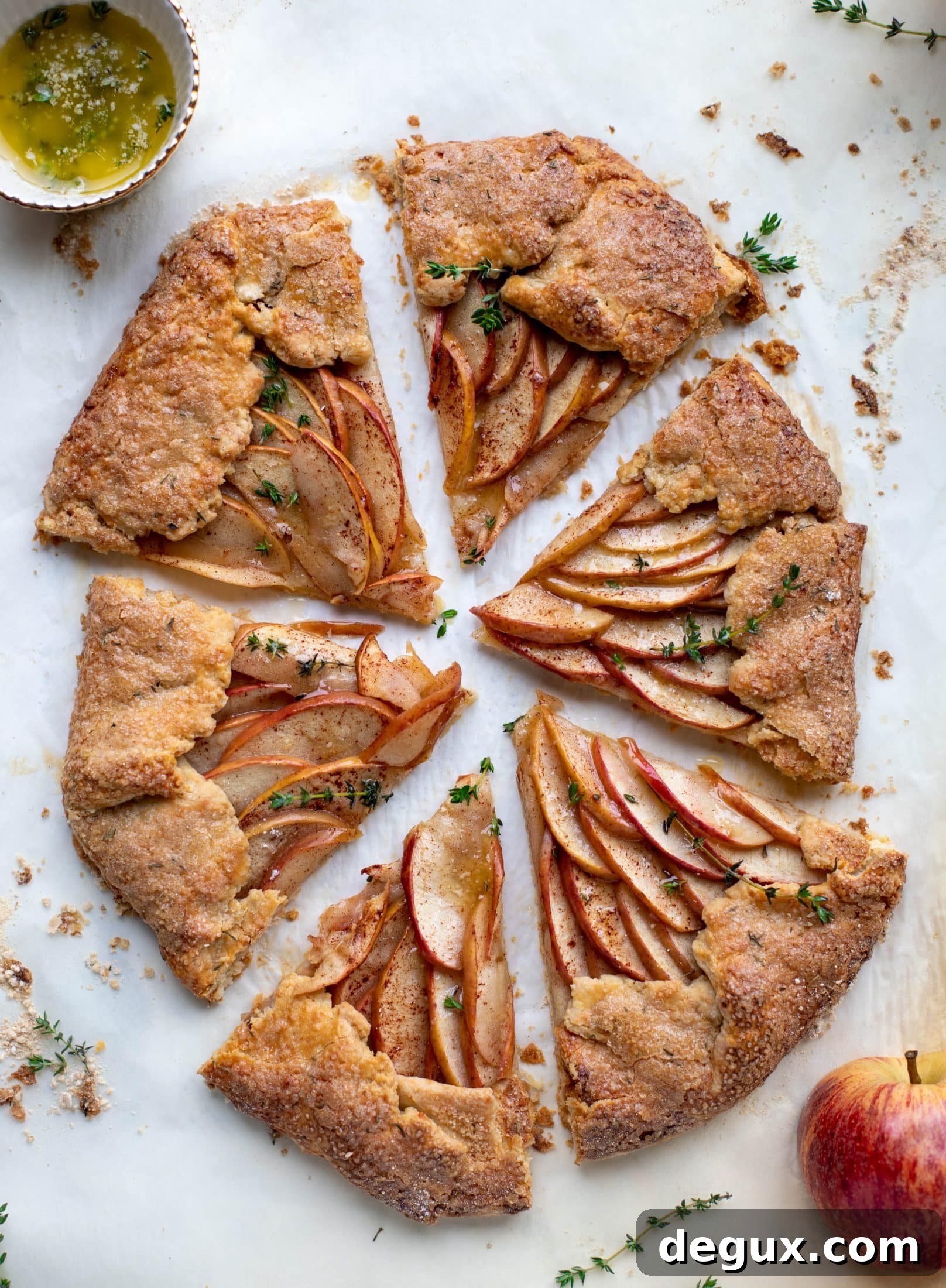 Honeycrisp Apple Galette with Cheddar Crust and Thyme Butter 11 https://www.howsweeteats.com/2015/07/summer-chicken-pot-pie-crostata-with-herbed-crust/