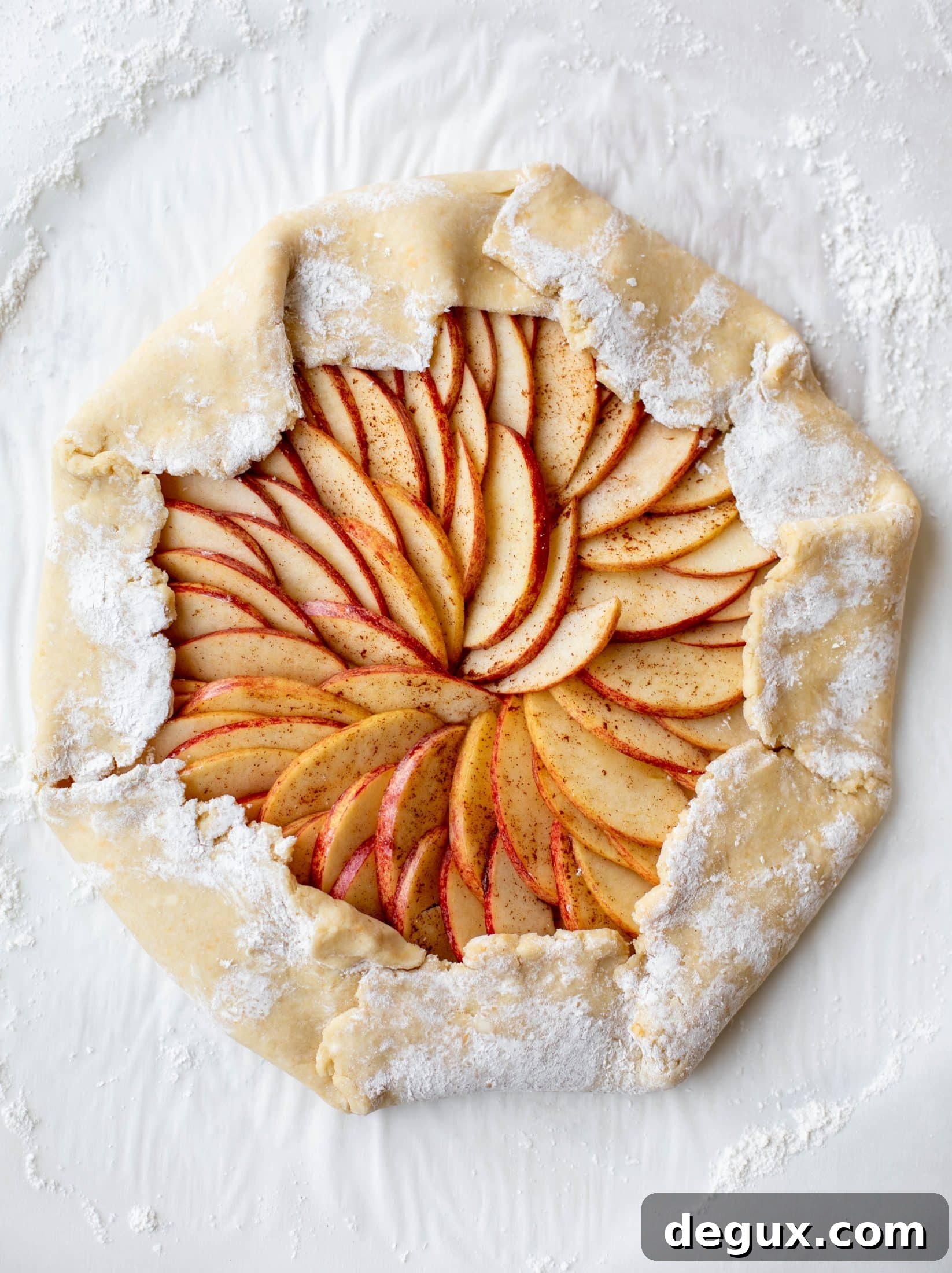 Honeycrisp Apple Galette with Cheddar Crust and Thyme Butter 4 This apple cheddar galette is made with honeycrisp apples, set in a cheddar herb crust and brushed with thyme butter! So delicious and perfect for fall.