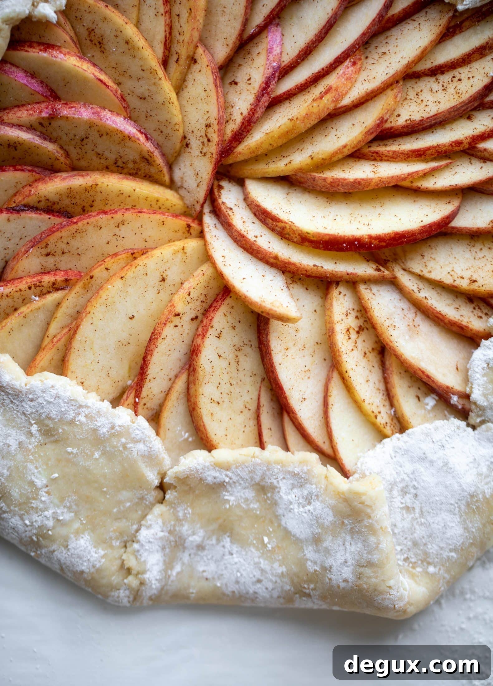 Honeycrisp Apple Galette with Cheddar Crust and Thyme Butter 5 This apple cheddar galette is made with honeycrisp apples, set in a cheddar herb crust and brushed with thyme butter! So delicious and perfect for fall.